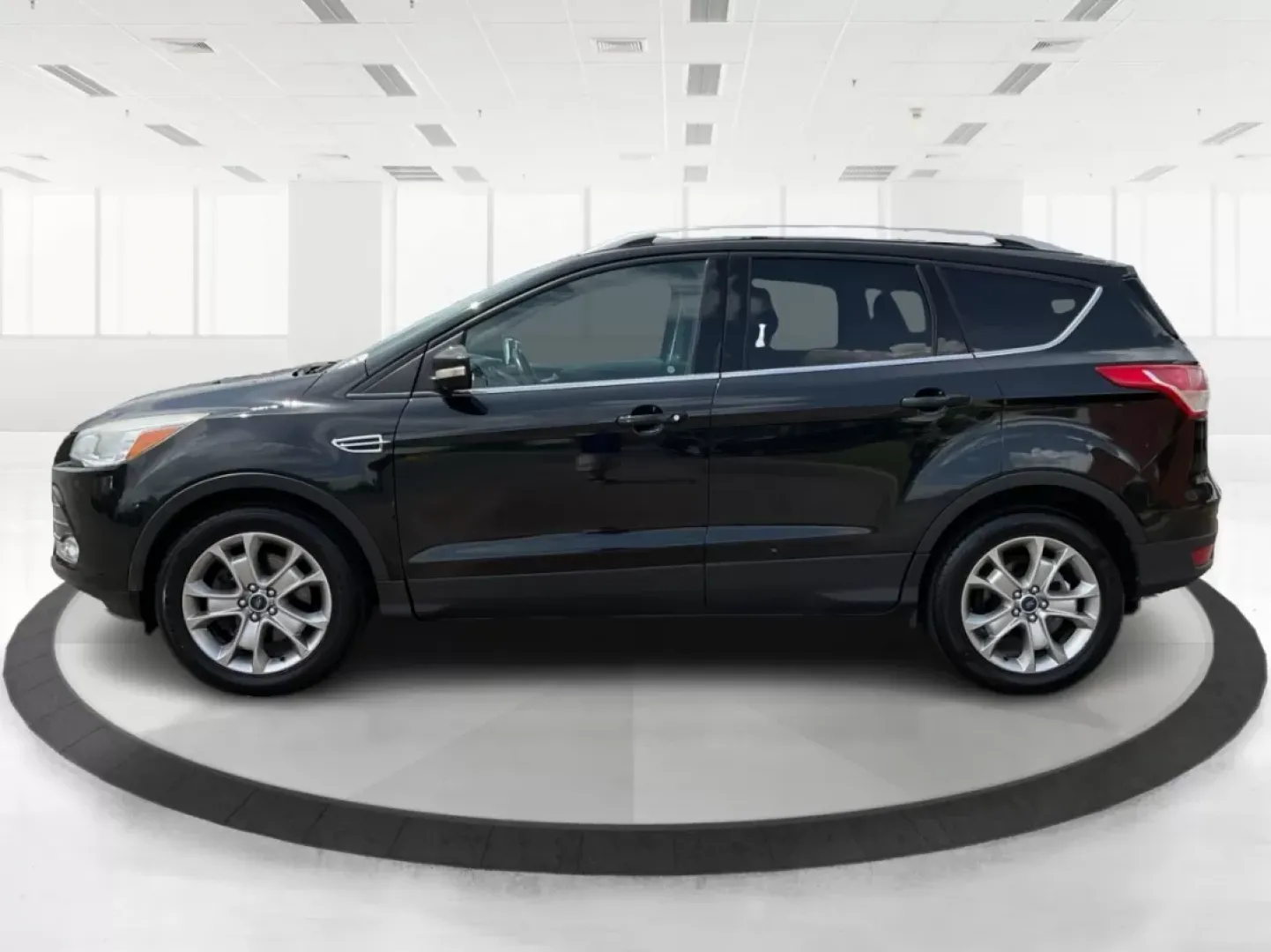 2015 Ford Escape Titanium (1FMCU9J95FU) with an Other engine, located at 1230 East Main St, Xenia, OH, 45385, (937) 908-9800, 39.688026, -83.910172 - Discover your next adventure with the 2015 Ford Escape Titanium, now available at Advantage Car and Credit in Fairborn, OH! Whether you're looking for a family-friendly SUV, a reliable commuter vehicle, or a versatile option for weekend getaways, this Escape checks all the boxes. With a stunning Tux - Photo#4
