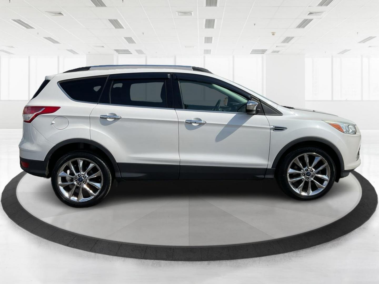 2015 Ford Escape SE (1FMCU9G92FU) with an EcoBoost 1.6L I-4 gasoline direct injection engine, located at 4508 South Dixie Dr, Moraine, OH, 45439, (937) 908-9800, 39.689976, -84.218452 - 2015 Ford Escape SE - Photo#1