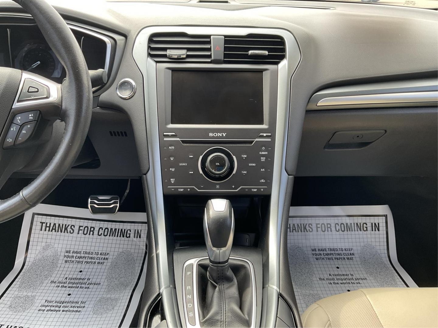 2015 Ford Fusion Titanium (3FA6P0K96FR) with an EcoBoost 2L I-4 gasoline direct injection engine, located at 8750 N County Rd 25A, Piqua, OH, 45356, (937) 908-9800, 40.164391, -84.232513 - 2015 Ford Fusion Titanium - Photo#12