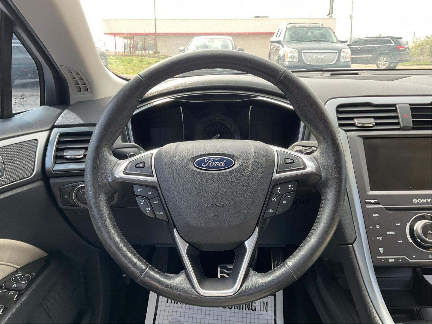 2015 Ford Fusion Titanium (3FA6P0K96FR) with an EcoBoost 2L I-4 gasoline direct injection engine, located at 8750 N County Rd 25A, Piqua, OH, 45356, (937) 908-9800, 40.164391, -84.232513 - 2015 Ford Fusion Titanium - Photo#15