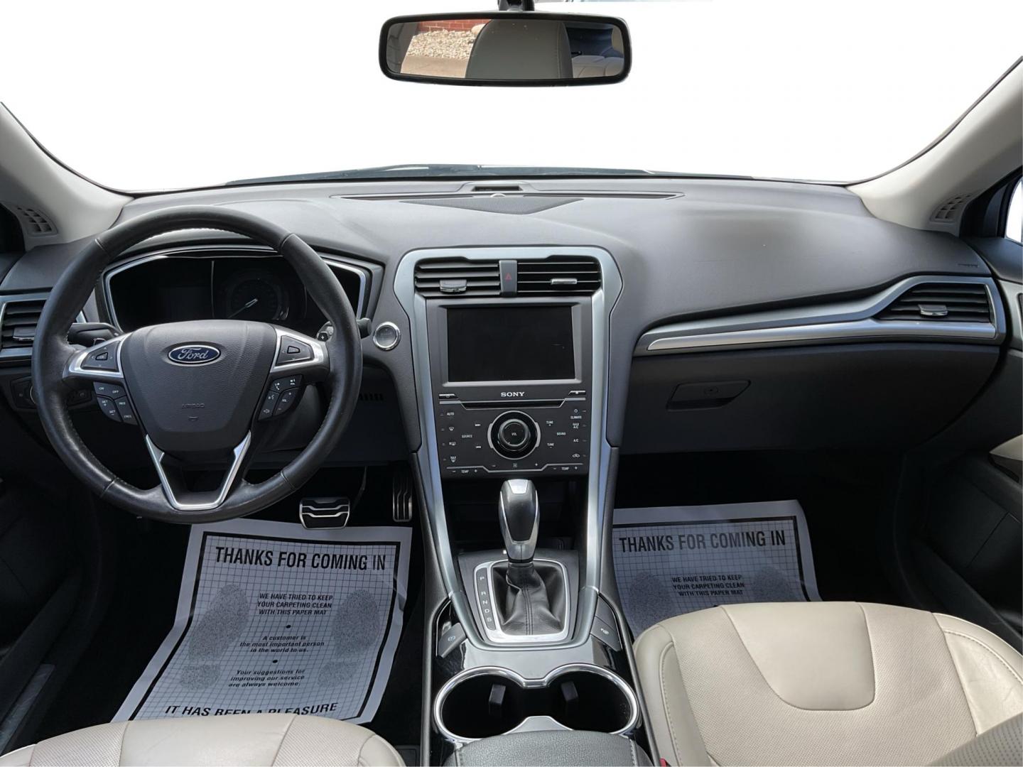 2015 Ford Fusion Titanium (3FA6P0K96FR) with an EcoBoost 2L I-4 gasoline direct injection engine, located at 8750 N County Rd 25A, Piqua, OH, 45356, (937) 908-9800, 40.164391, -84.232513 - 2015 Ford Fusion Titanium - Photo#20