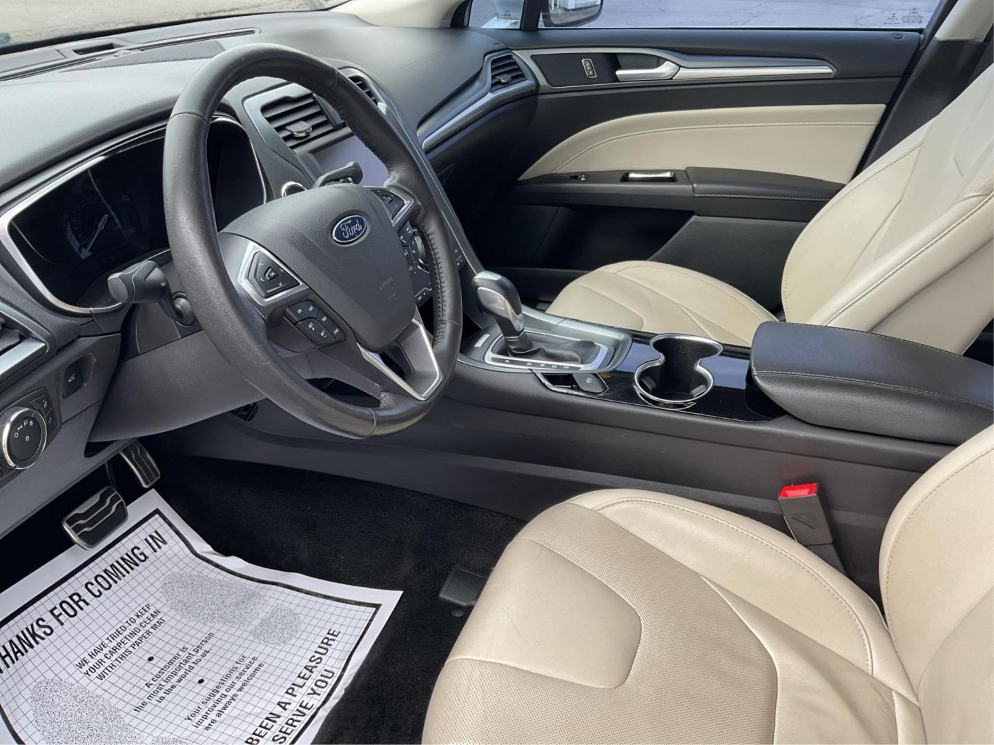 2015 Ford Fusion Titanium (3FA6P0K96FR) with an EcoBoost 2L I-4 gasoline direct injection engine, located at 8750 N County Rd 25A, Piqua, OH, 45356, (937) 908-9800, 40.164391, -84.232513 - 2015 Ford Fusion Titanium - Photo#8