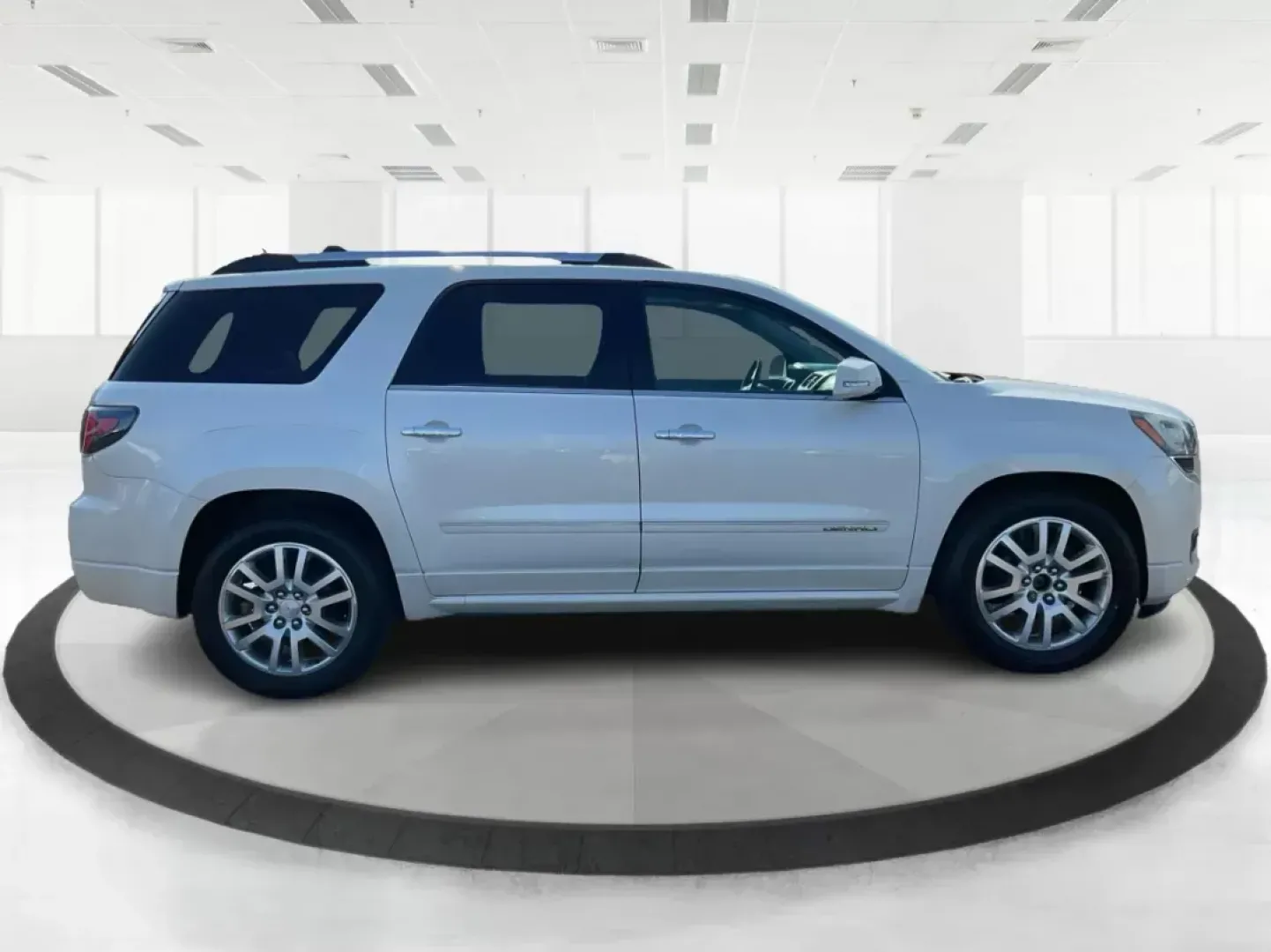 2015 GMC Acadia Denali (1GKKVTKD9FJ) with an 3.6L V-6 gasoline direct injection engine, located at 1951 S Dayton Lakeview Rd., New Carlisle, OH, 45344, (937) 908-9800, 39.890999, -84.050255 - Are you ready to elevate your family adventures or tackle daily commutes with style and comfort? Look no further than this stunning 2015 GMC Acadia Denali, a perfect combination of luxury and functionality available now at Advantage Car and Credit in Fairborn, OH. With room for everyone and plenty o - Photo#1