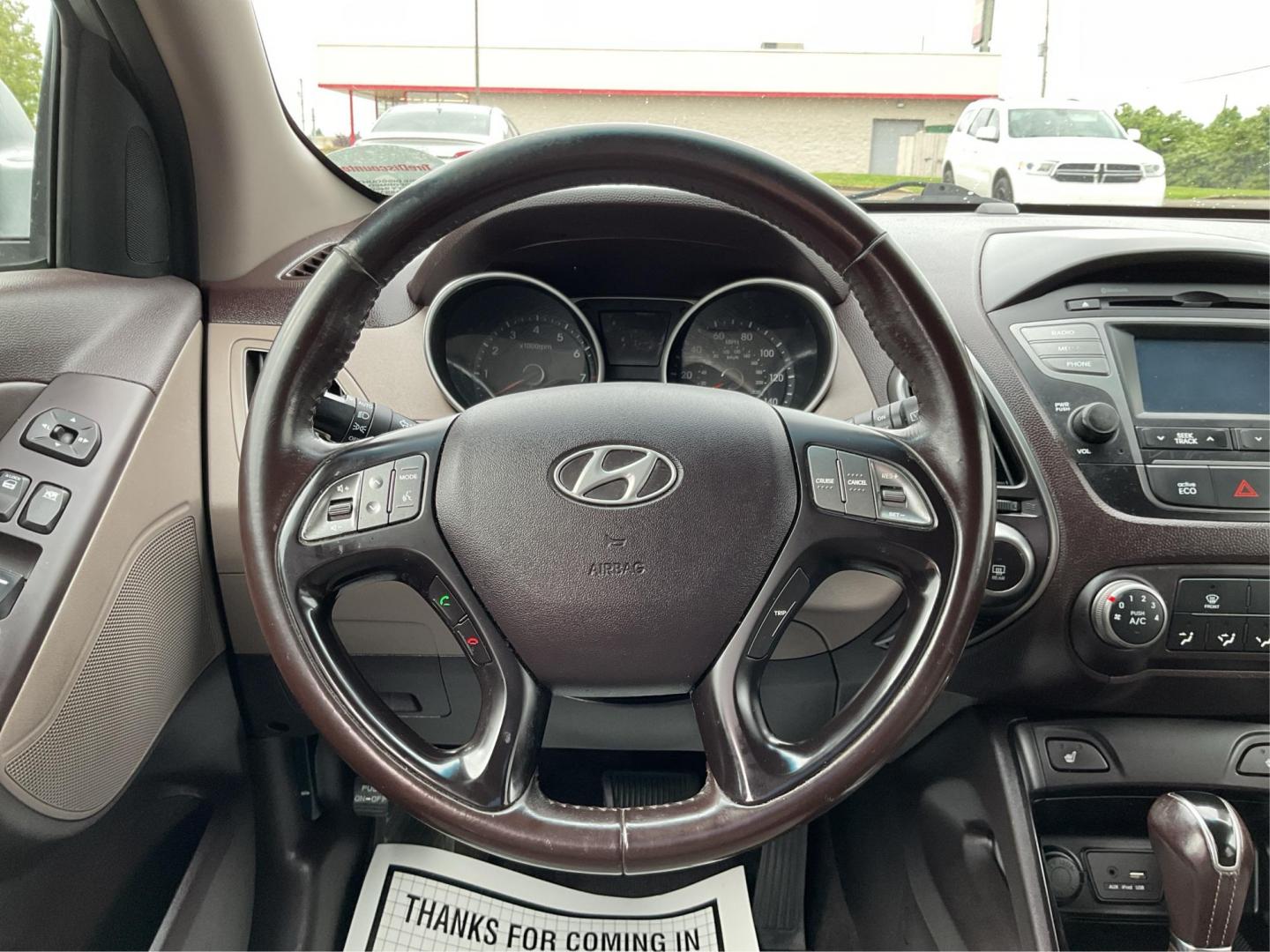 2015 Hyundai Tucson SE (KM8JUCAG2FU) with an Theta II 2.4L I-4 gasoline direct injection engine, located at 880 E. National Road, Vandalia, OH, 45377, (937) 908-9800, 39.891918, -84.183594 - 2015 Hyundai Tucson SE - Photo#16