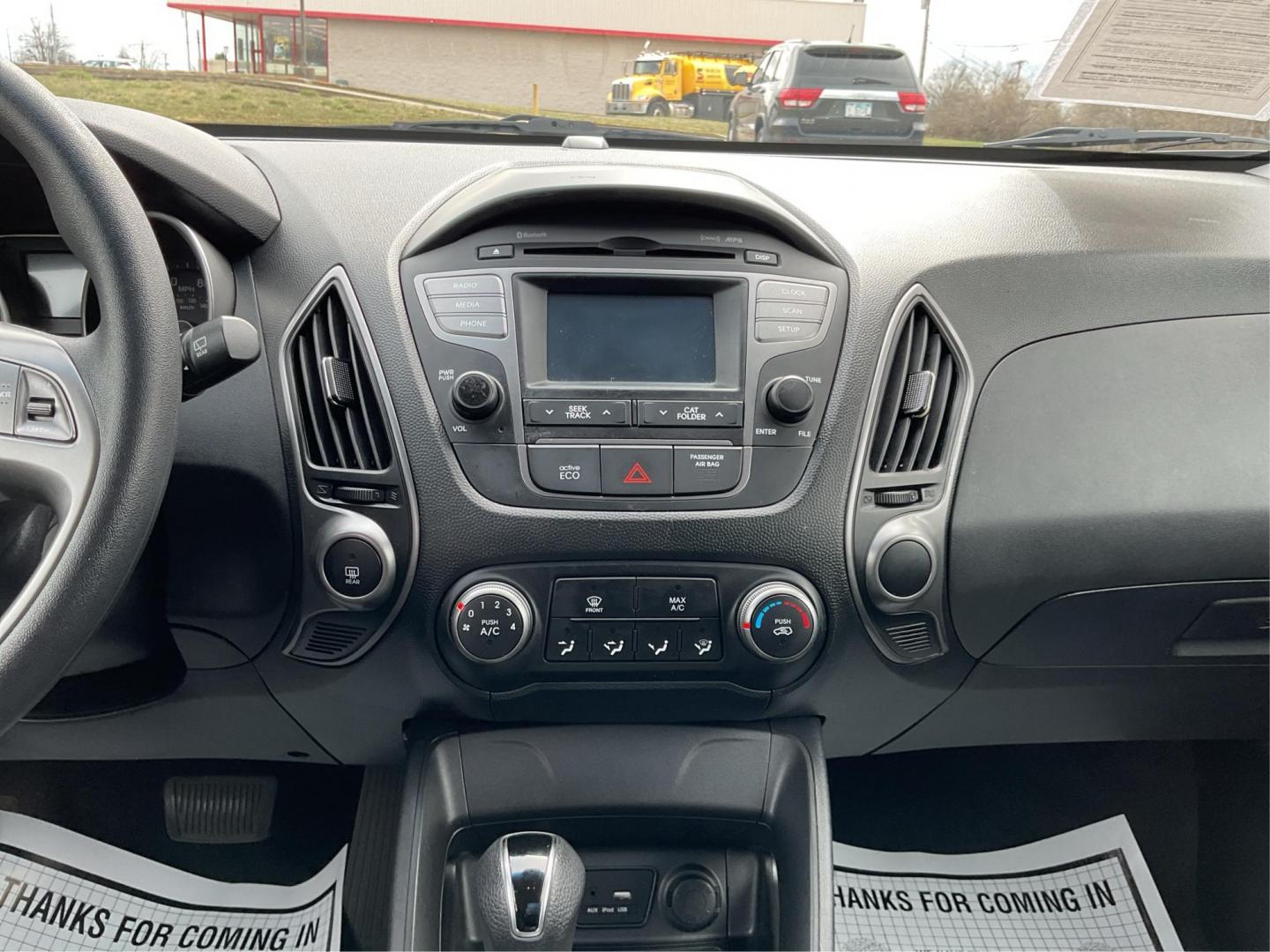 2015 Hyundai Tucson GLS (KM8JTCAF1FU) with an Nu 2L I-4 gasoline direct injection engine, located at 1184 Kauffman Ave, Fairborn, OH, 45324, (937) 908-9800, 39.807072, -84.030914 - 2015 Hyundai Tucson GLS - Photo#11