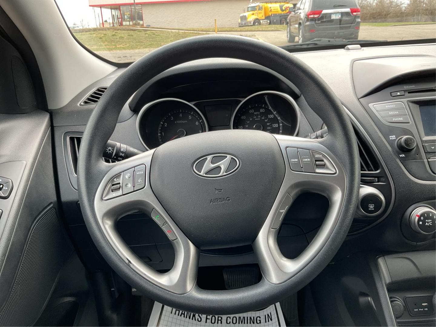 2015 Hyundai Tucson GLS (KM8JTCAF1FU) with an Nu 2L I-4 gasoline direct injection engine, located at 1184 Kauffman Ave, Fairborn, OH, 45324, (937) 908-9800, 39.807072, -84.030914 - 2015 Hyundai Tucson GLS - Photo#14