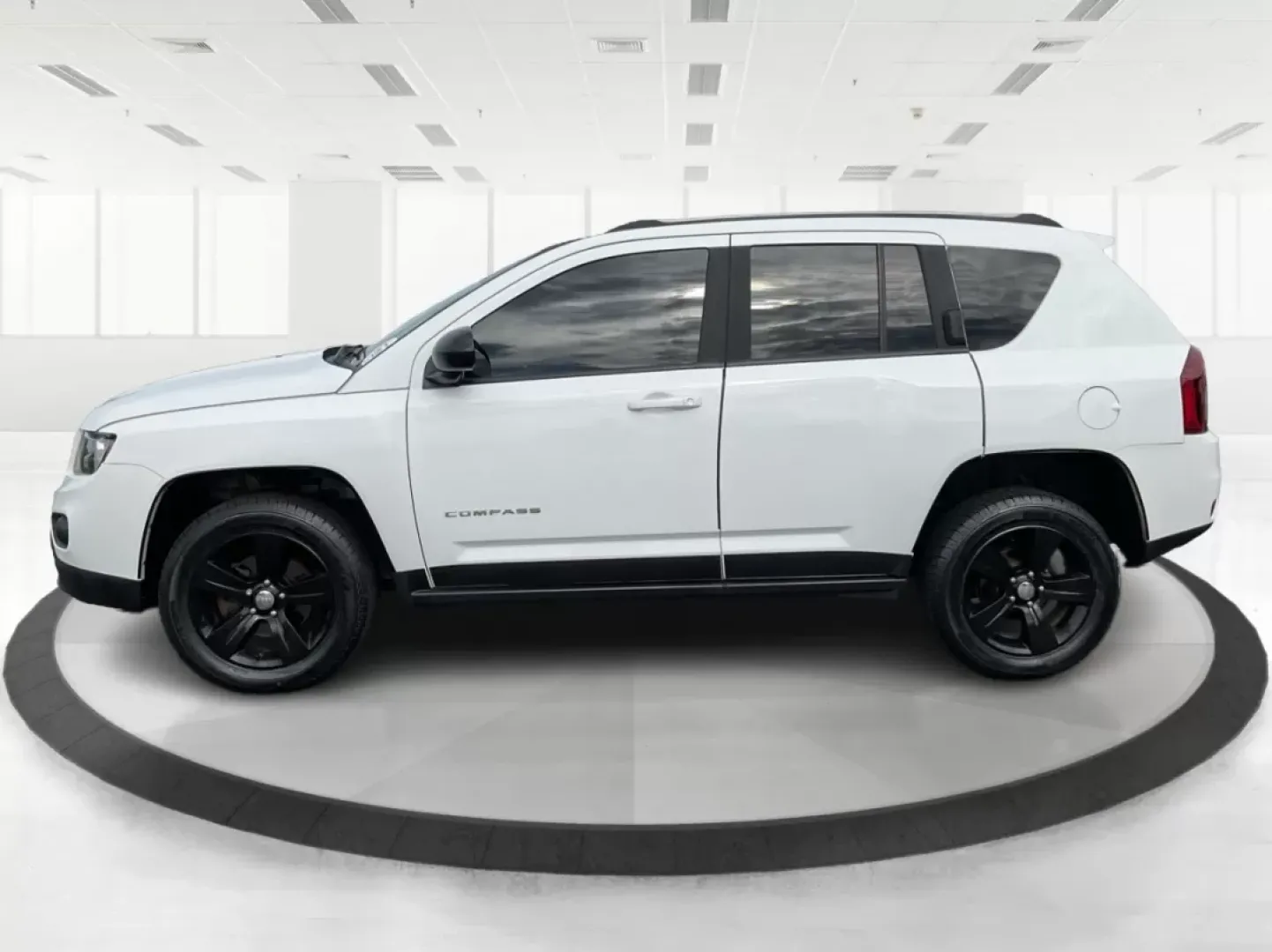 2015 Jeep Compass Sport (1C4NJDBB6FD) with an 2.4L I-4 DOHC engine, located at 880 E. National Road, Vandalia, OH, 45377, (937) 908-9800, 39.891918, -84.183594 - **Explore Adventure and Comfort with the 2015 Jeep Compass Sport at Advantage Car and Credit!**<br /> <br /> Whether you're navigating your daily commute or embarking on a weekend getaway, the 2015 Jeep Compass Sport is designed with versatility in mind. With a spacious interior and rugged capabilit - Photo#5