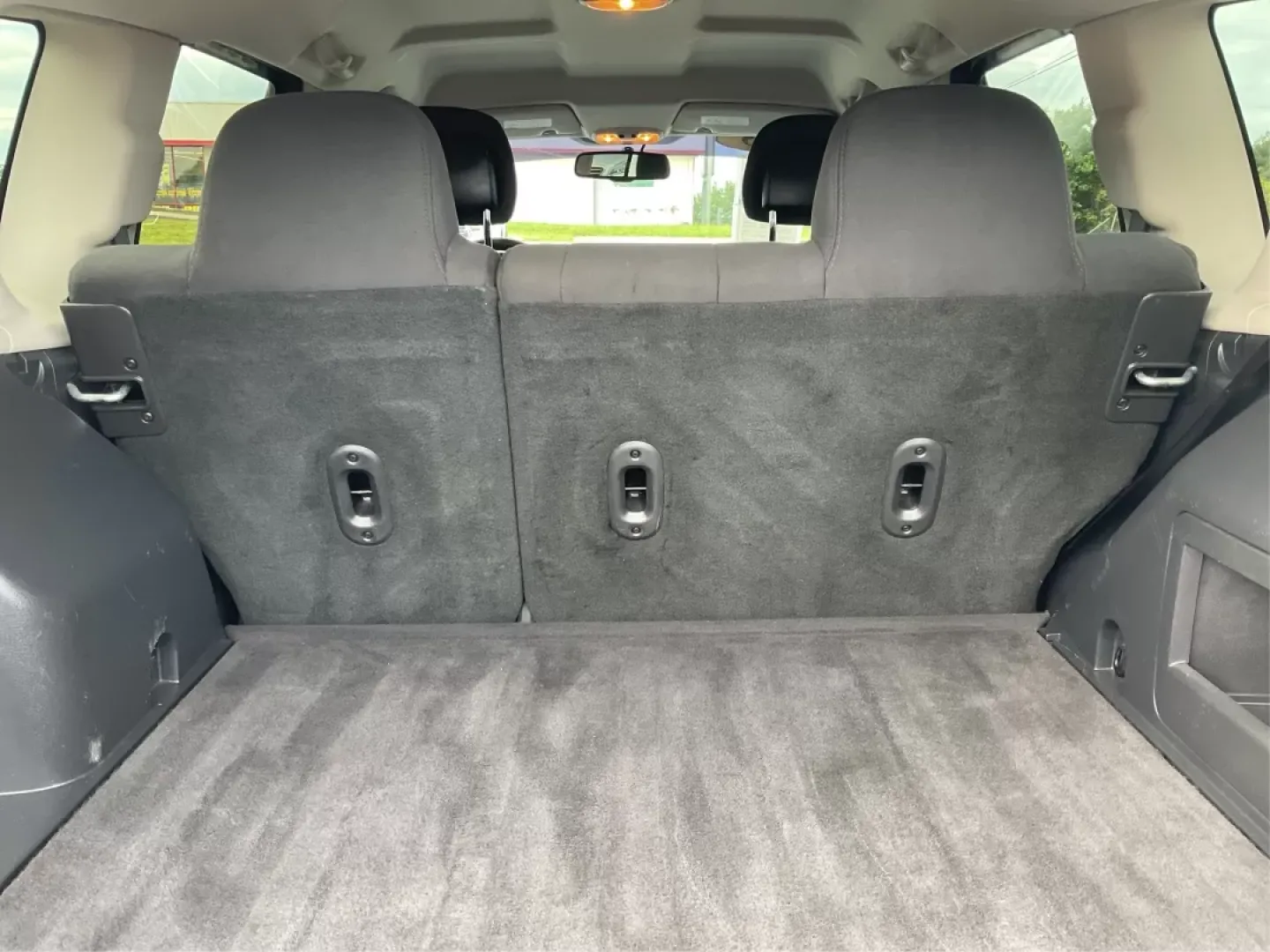 2015 Jeep Compass Sport (1C4NJDBB6FD) with an 2.4L I-4 DOHC engine, located at 880 E. National Road, Vandalia, OH, 45377, (937) 908-9800, 39.891918, -84.183594 - **Explore Adventure and Comfort with the 2015 Jeep Compass Sport at Advantage Car and Credit!**<br /> <br /> Whether you're navigating your daily commute or embarking on a weekend getaway, the 2015 Jeep Compass Sport is designed with versatility in mind. With a spacious interior and rugged capabilit - Photo#12