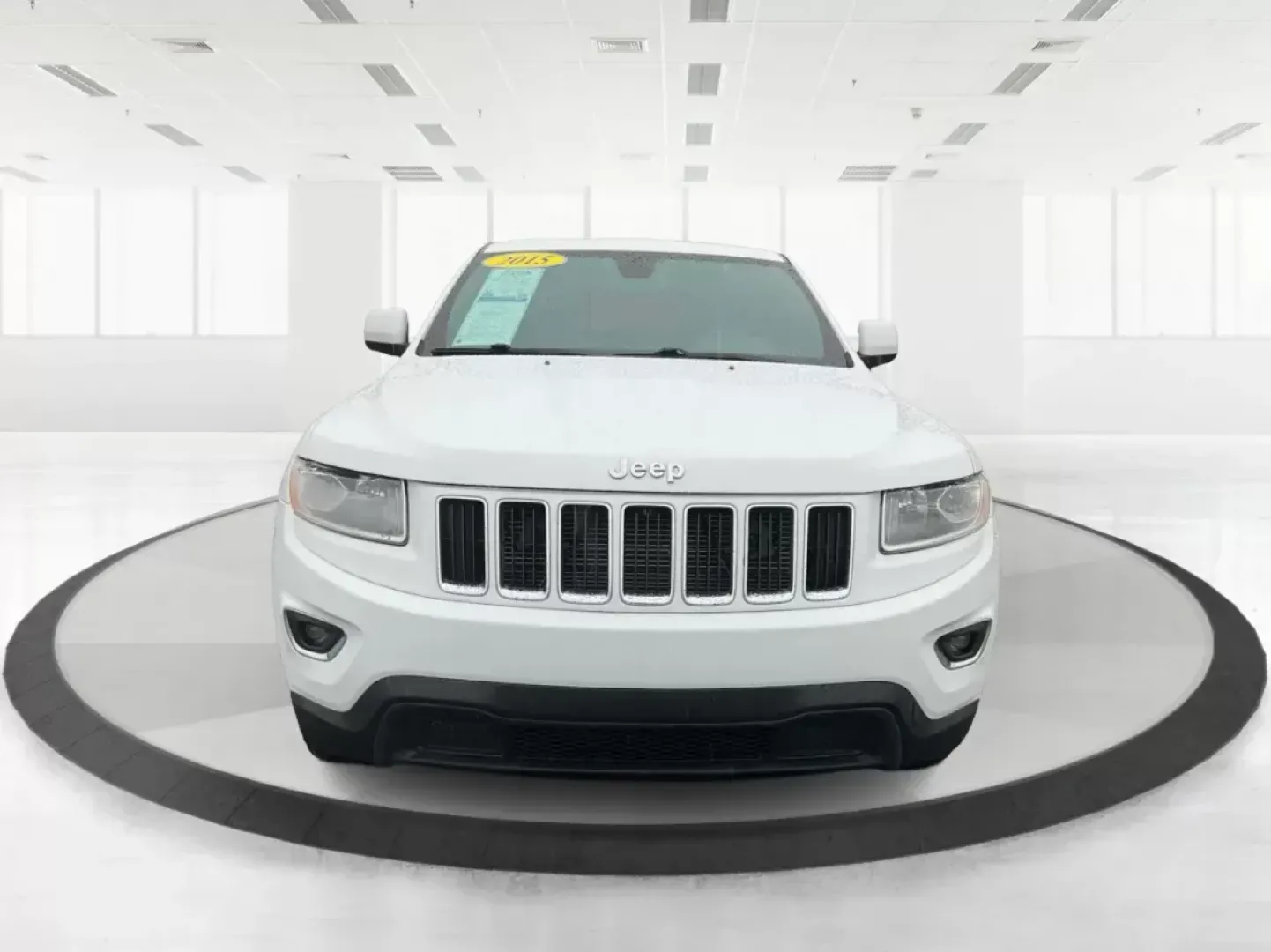 2015 Jeep Grand Cherokee Laredo (1C4RJFAG7FC) with an 3.6L V-6 DOHC engine, located at 8750 N County Rd 25A, Piqua, OH, 45356, (937) 908-9800, 40.164391, -84.232513 - 2015 Jeep Grand Cherokee Laredo - Photo#6