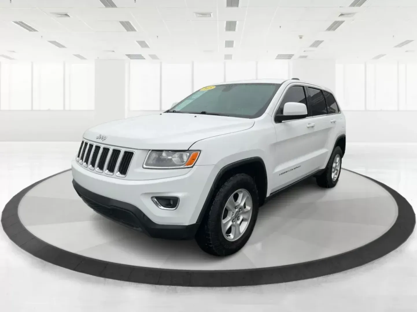 2015 Jeep Grand Cherokee Laredo (1C4RJFAG7FC) with an 3.6L V-6 DOHC engine, located at 8750 N County Rd 25A, Piqua, OH, 45356, (937) 908-9800, 40.164391, -84.232513 - 2015 Jeep Grand Cherokee Laredo - Photo#7