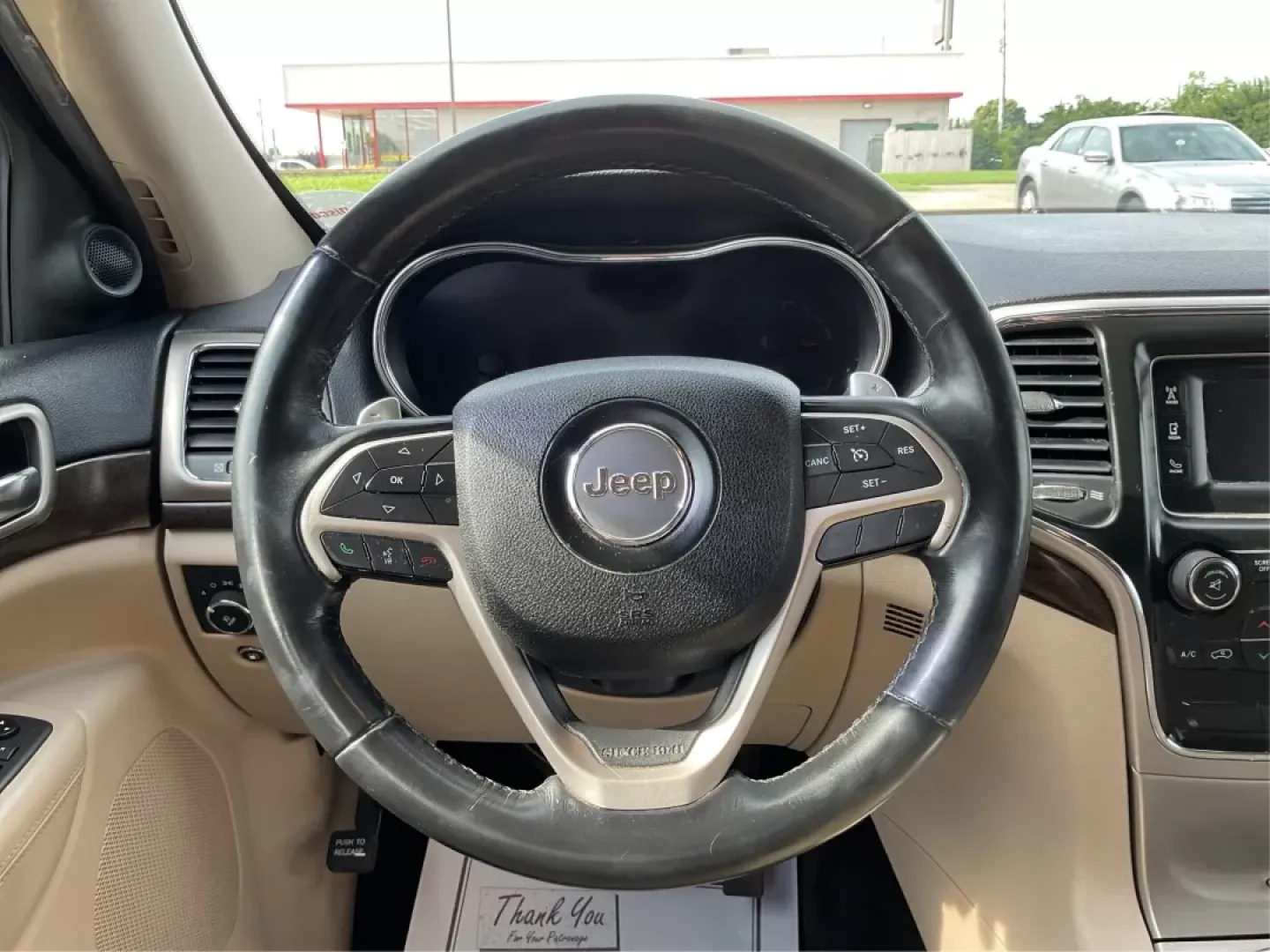 2015 Jeep Grand Cherokee Laredo (1C4RJEAG1FC) with an 3.6L V-6 DOHC engine, located at 4508 South Dixie Dr, Moraine, OH, 45439, (937) 908-9800, 39.689976, -84.218452 - **Discover Adventure with the 2015 Jeep Grand Cherokee Laredo: Your Ideal SUV for Every Journey!**<br /> <br /> Are you searching for the perfect SUV that caters to your adventurous lifestyle? Look no further than this stunning 2015 Jeep Grand Cherokee Laredo, available at Advantage Car and Credit i - Photo#15