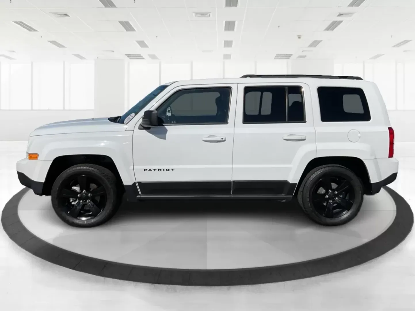 2015 Jeep Patriot Altitude Edition (1C4NJPBA1FD) with an 2L I-4 DOHC engine, located at 880 E. National Road, Vandalia, OH, 45377, (937) 908-9800, 39.891918, -84.183594 - Are you ready to elevate your adventures and embrace a life filled with excitement? If you're a weekend wanderer or a growing family looking for a reliable SUV, the 2015 Jeep Patriot Altitude Edition at Advantage Car and Credit is here to meet your needs. With its spacious interior, rugged design, a - Photo#3