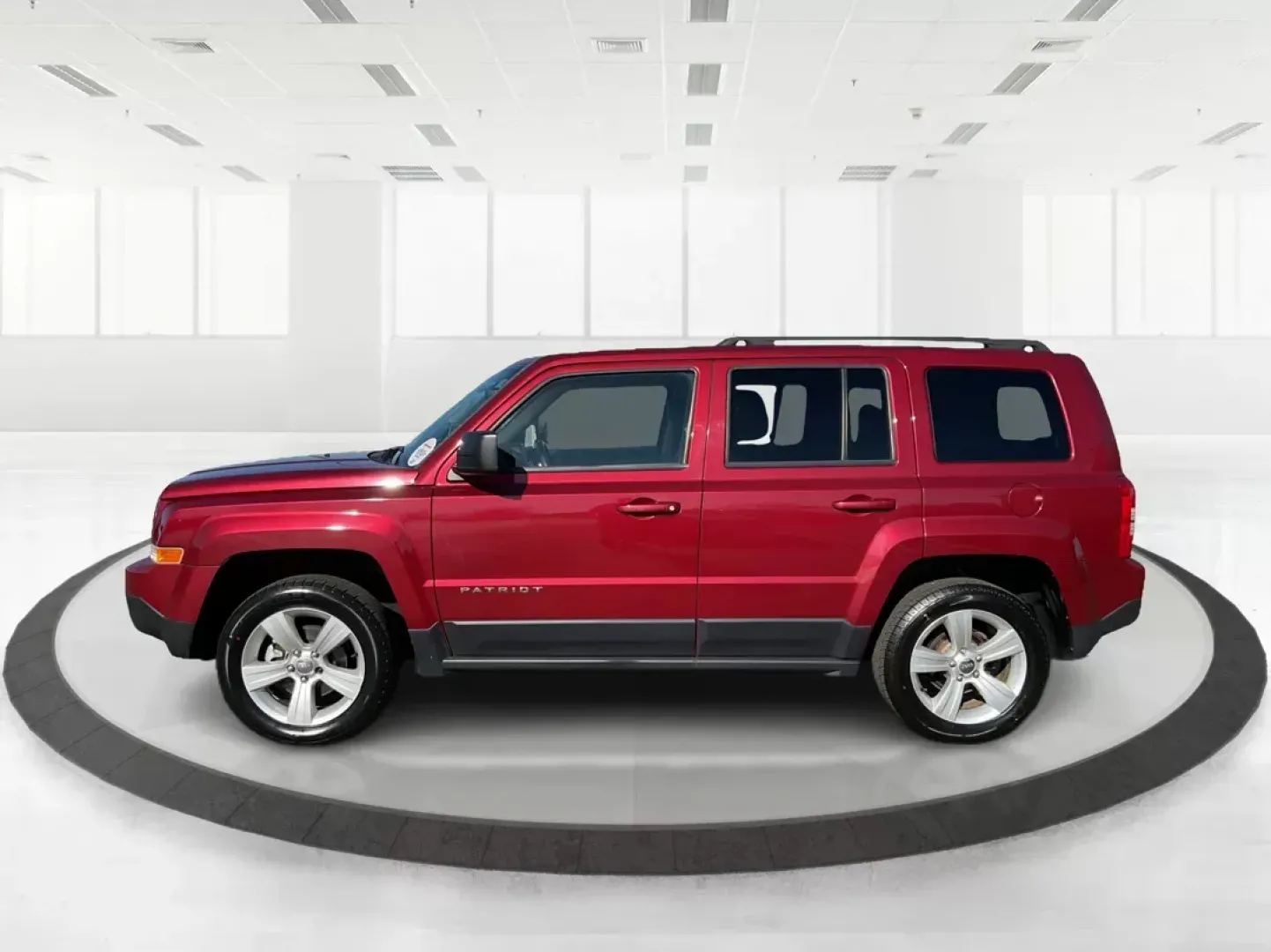 2015 Jeep Patriot Latitude (1C4NJRFB2FD) with an 2.4L I-4 DOHC engine, located at 1099 N County Rd 25A, Troy, OH, 45373, (937) 908-9800, 40.057079, -84.212883 - 2015 Jeep Patriot Latitude - Photo#4