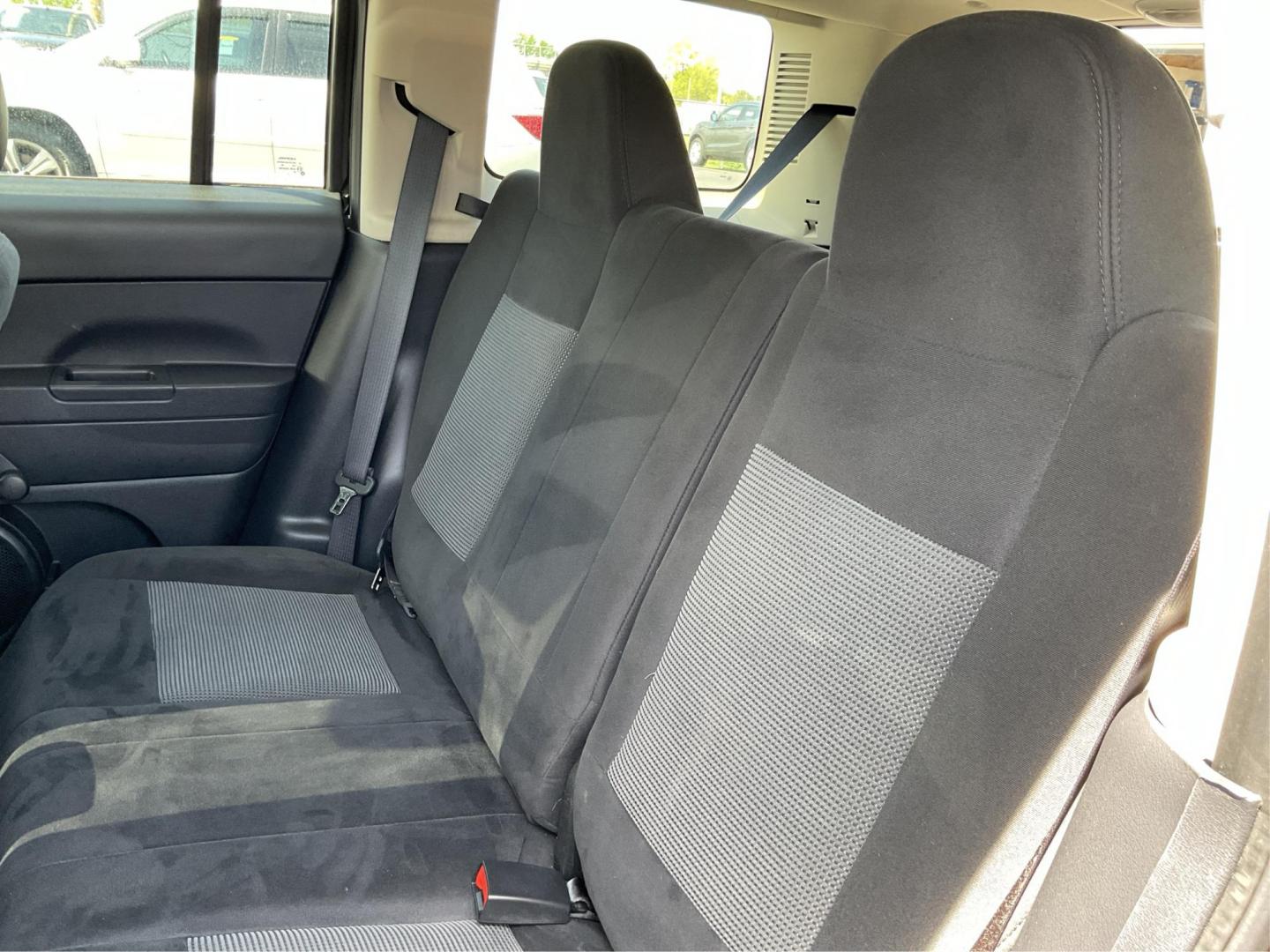 2015 Black Clearcoat Jeep Patriot Sport 2WD (1C4NJPBA6FD) with an 2.0L L4 DOHC 16V engine, located at 1951 S Dayton Lakeview Rd., New Carlisle, OH, 45344, (937) 908-9800, 39.890999, -84.050255 - 2015 Jeep Patriot Sport 2WD - Photo#9