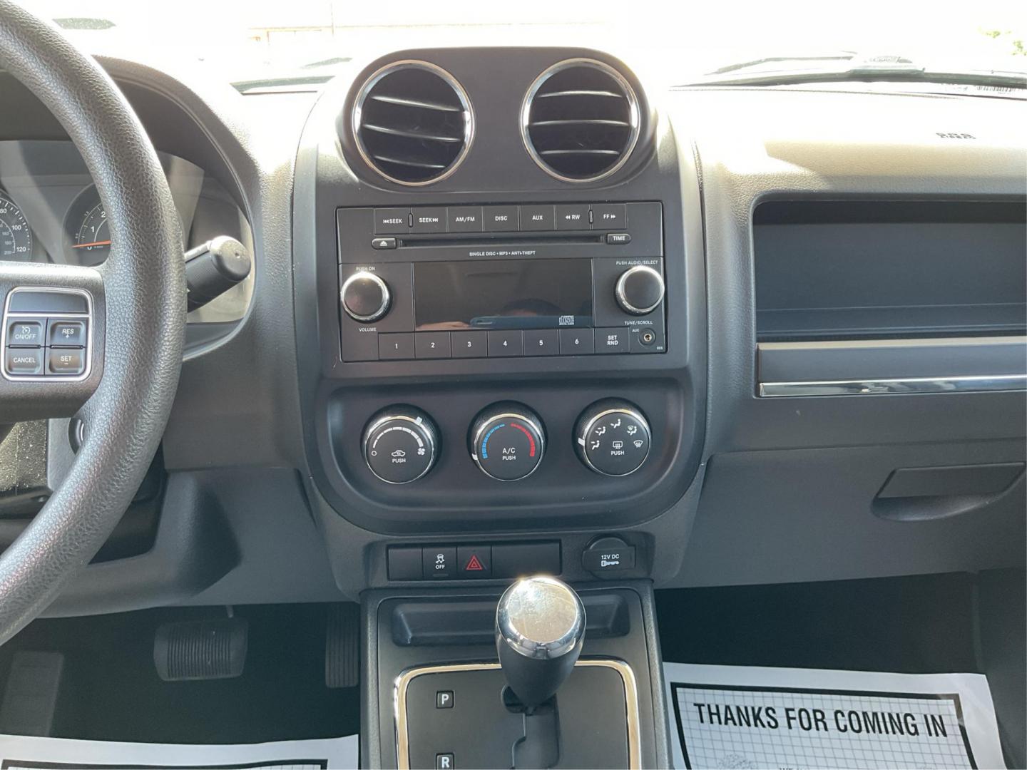 2015 Black Clearcoat Jeep Patriot Sport 2WD (1C4NJPBA6FD) with an 2.0L L4 DOHC 16V engine, located at 1951 S Dayton Lakeview Rd., New Carlisle, OH, 45344, (937) 908-9800, 39.890999, -84.050255 - 2015 Jeep Patriot Sport 2WD - Photo#12
