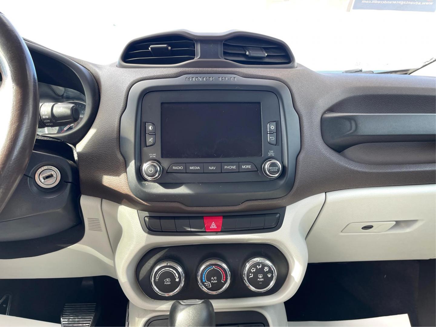 2015 Jeep Renegade Latitude 4WD (ZACCJBBT2FP) with an 2.4L L4 DOHC 16V engine, 6-Speed Manual transmission, located at 1184 Kauffman Ave, Fairborn, OH, 45324, (937) 908-9800, 39.807072, -84.030914 - 2015 Jeep Renegade Latitude 4WD - Photo#12