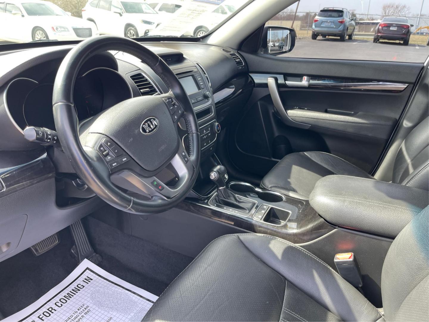 2015 Kia Sorento EX V6 (5XYKU4A74FG) with an Lambda II 3.3L V-6 gasoline direct injection engine, located at 8750 N County Rd 25A, Piqua, OH, 45356, (937) 908-9800, 40.164391, -84.232513 - 2015 Kia Sorento EX V6 - Photo#8