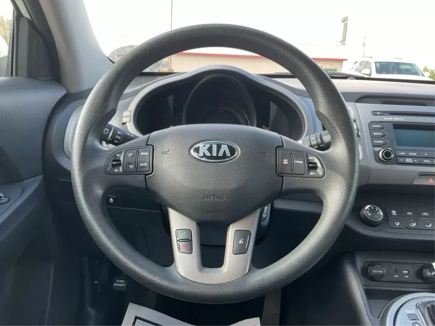 2015 Kia Sportage LX (KNDPB3AC1F7) with an Other engine, located at 1951 S Dayton Lakeview Rd., New Carlisle, OH, 45344, (937) 908-9800, 39.890999, -84.050255 - Are you looking for a versatile vehicle that can handle your family's daily adventures while also being budget-friendly? Look no further than this 2015 Kia Sportage LX, now available at Advantage Car and Credit in Fairborn, OH. This stylish crossover SUV is perfect for growing families, weekend geta - Photo#14