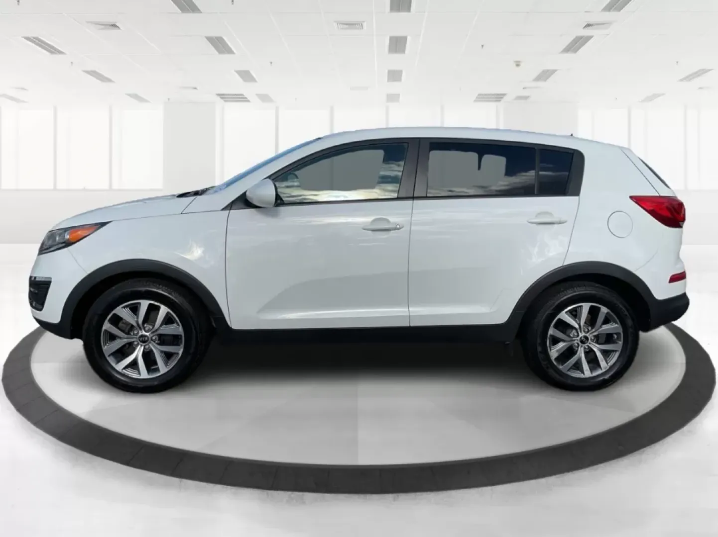2015 Kia Sportage LX (KNDPB3AC1F7) with an Other engine, located at 1951 S Dayton Lakeview Rd., New Carlisle, OH, 45344, (937) 908-9800, 39.890999, -84.050255 - Are you looking for a versatile vehicle that can handle your family's daily adventures while also being budget-friendly? Look no further than this 2015 Kia Sportage LX, now available at Advantage Car and Credit in Fairborn, OH. This stylish crossover SUV is perfect for growing families, weekend geta - Photo#4