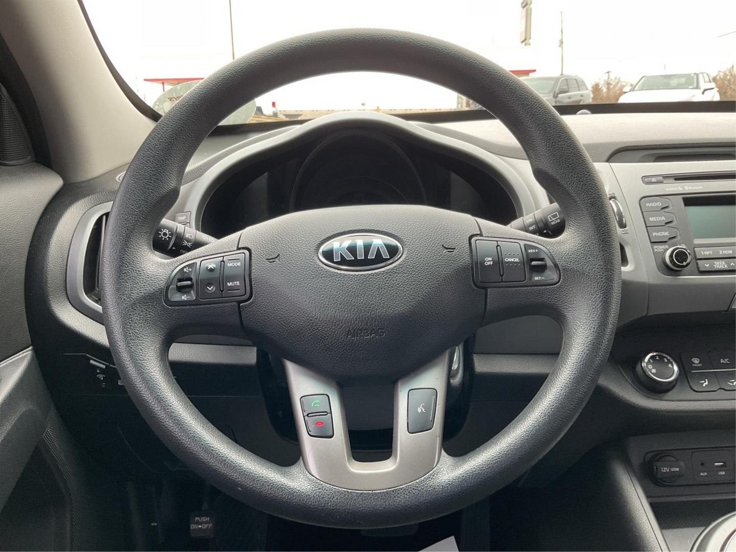 2015 Kia Sportage LX FWD (KNDPB3AC3F7) with an 2.4L V6 DOHC 24V engine, 6-Speed Automatic transmission, located at 1099 N County Rd 25A, Troy, OH, 45373, (937) 908-9800, 40.057079, -84.212883 - 2015 Kia Sportage LX FWD - Photo#15