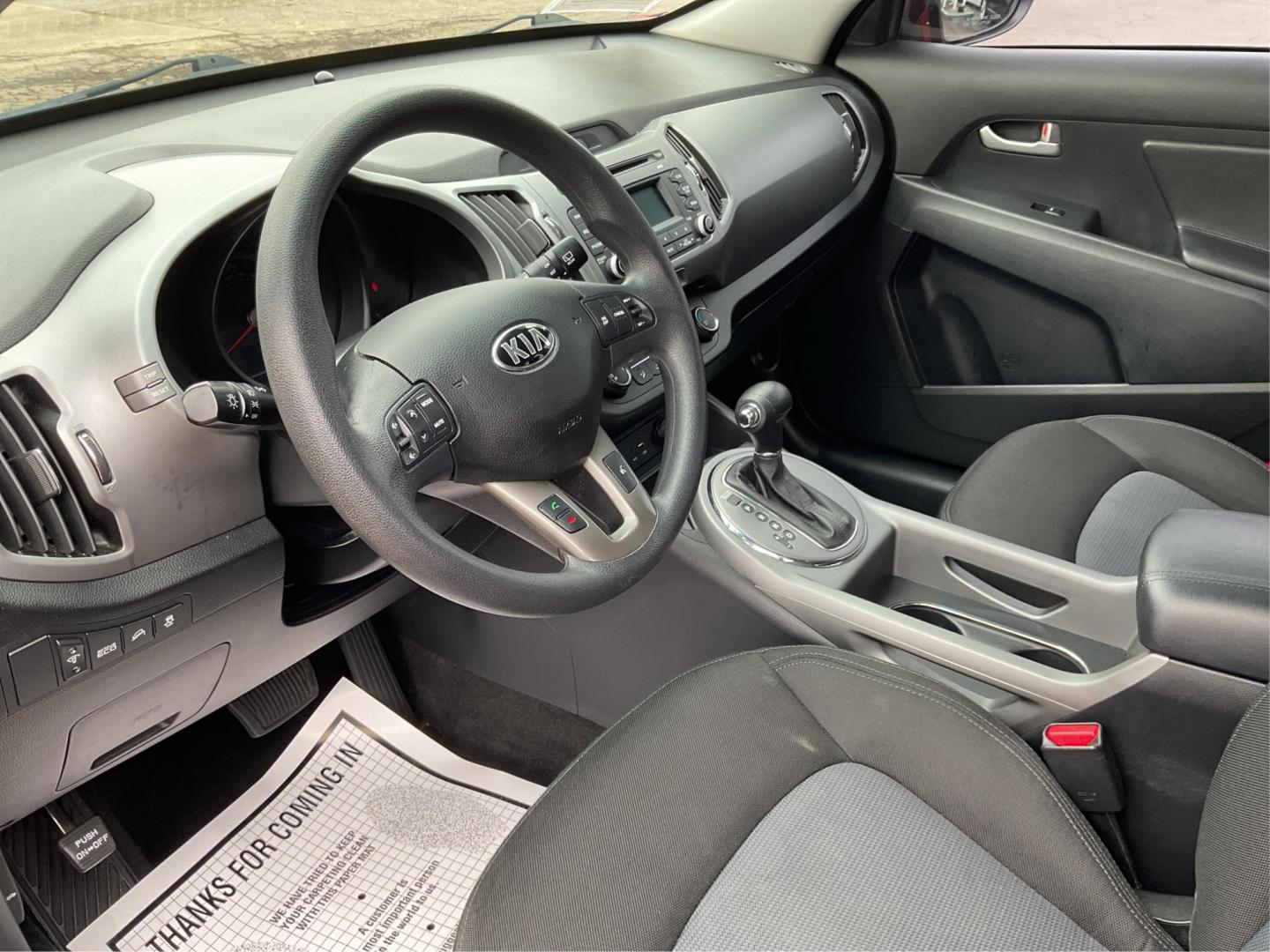 2015 Kia Sportage LX FWD (KNDPB3AC3F7) with an 2.4L V6 DOHC 24V engine, 6-Speed Automatic transmission, located at 1099 N County Rd 25A, Troy, OH, 45373, (937) 908-9800, 40.057079, -84.212883 - 2015 Kia Sportage LX FWD - Photo#8
