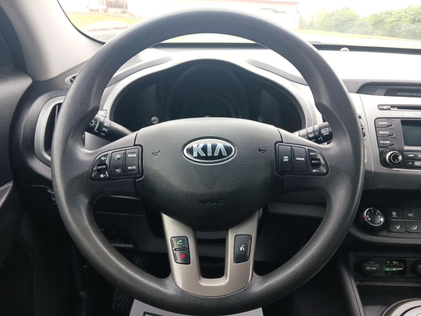 2015 Kia Sportage LX AWD (KNDPBCAC2F7) with an 2.4L V6 DOHC 24V engine, 6-Speed Automatic transmission, located at 1230 East Main St, Xenia, OH, 45385, (937) 908-9800, 39.688026, -83.910172 - 2015 Kia Sportage LX AWD - Photo#15