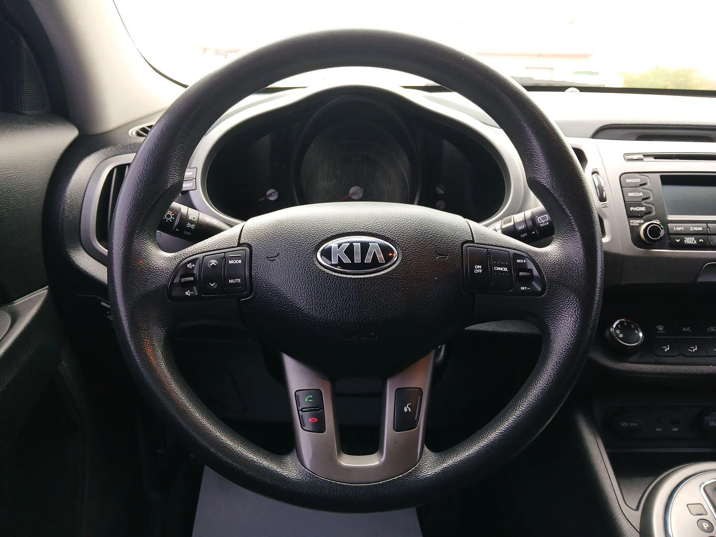 2015 Kia Sportage LX FWD (KNDPB3AC9F7) with an 2.4L V6 DOHC 24V engine, 6-Speed Automatic transmission, located at 880 E. National Road, Vandalia, OH, 45377, (937) 908-9800, 39.891918, -84.183594 - 2015 Kia Sportage LX FWD - Photo#14