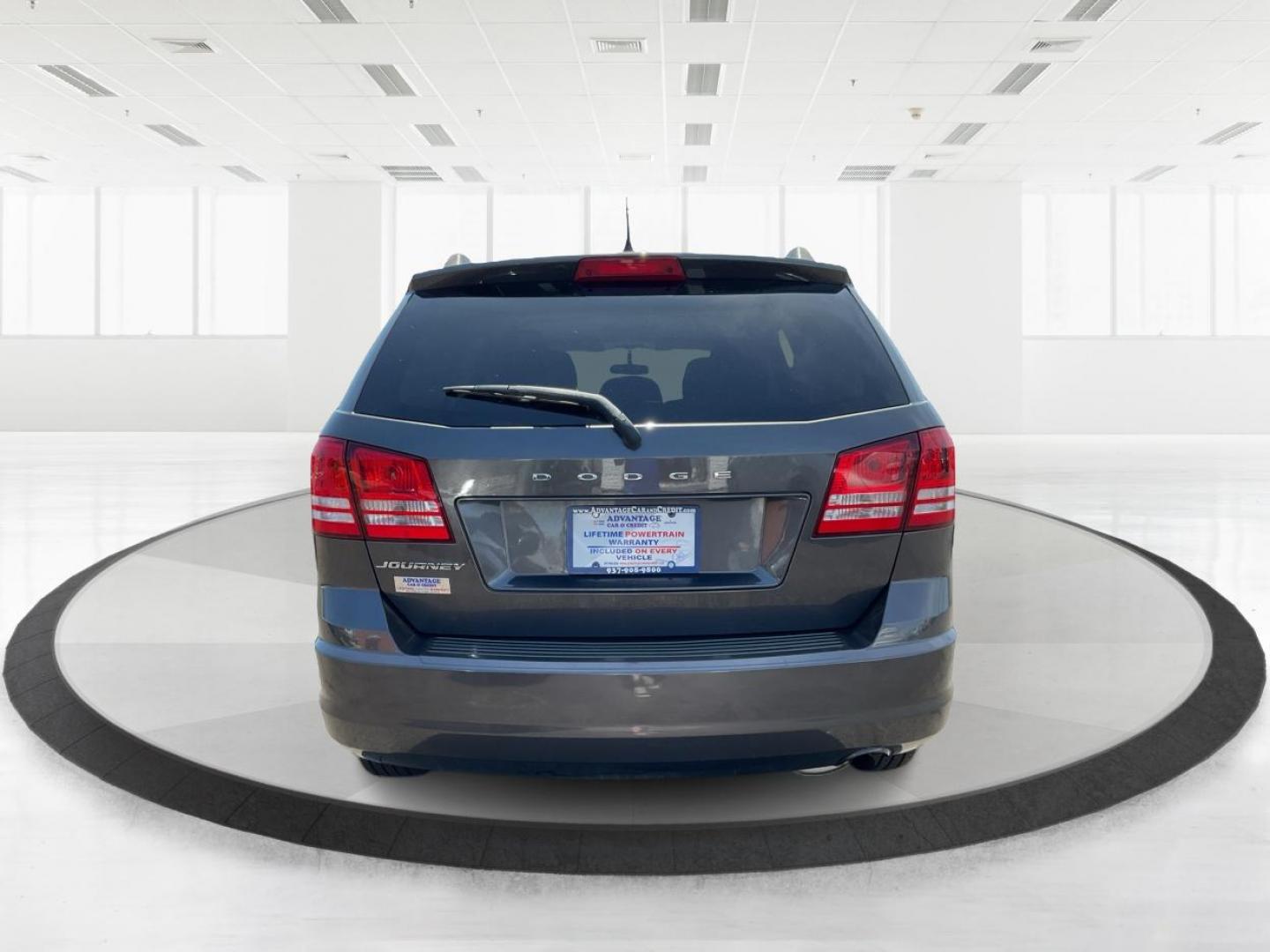 2016 Dodge Journey SE (3C4PDCAB7GT) with an 2.4L L4 DOHC 16V engine, 4-Speed Automatic transmission, located at 4508 South Dixie Dr, Moraine, OH, 45439, (937) 908-9800, 39.689976, -84.218452 - 2016 Dodge Journey SE - Photo#4