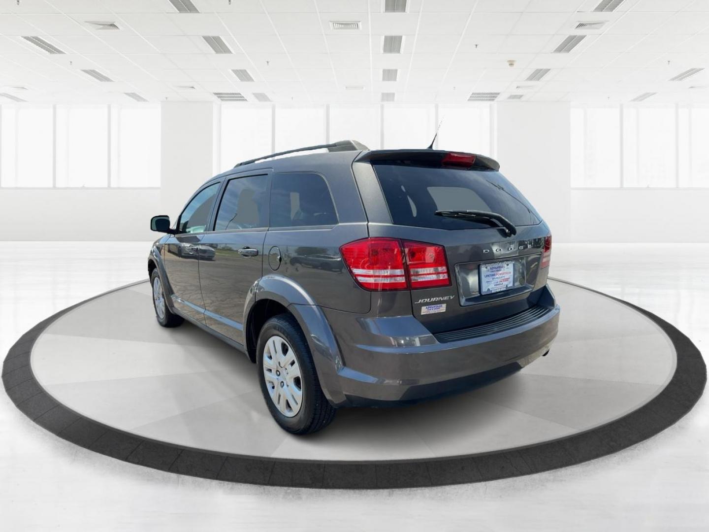 2016 Dodge Journey SE (3C4PDCAB7GT) with an 2.4L L4 DOHC 16V engine, 4-Speed Automatic transmission, located at 4508 South Dixie Dr, Moraine, OH, 45439, (937) 908-9800, 39.689976, -84.218452 - 2016 Dodge Journey SE - Photo#5