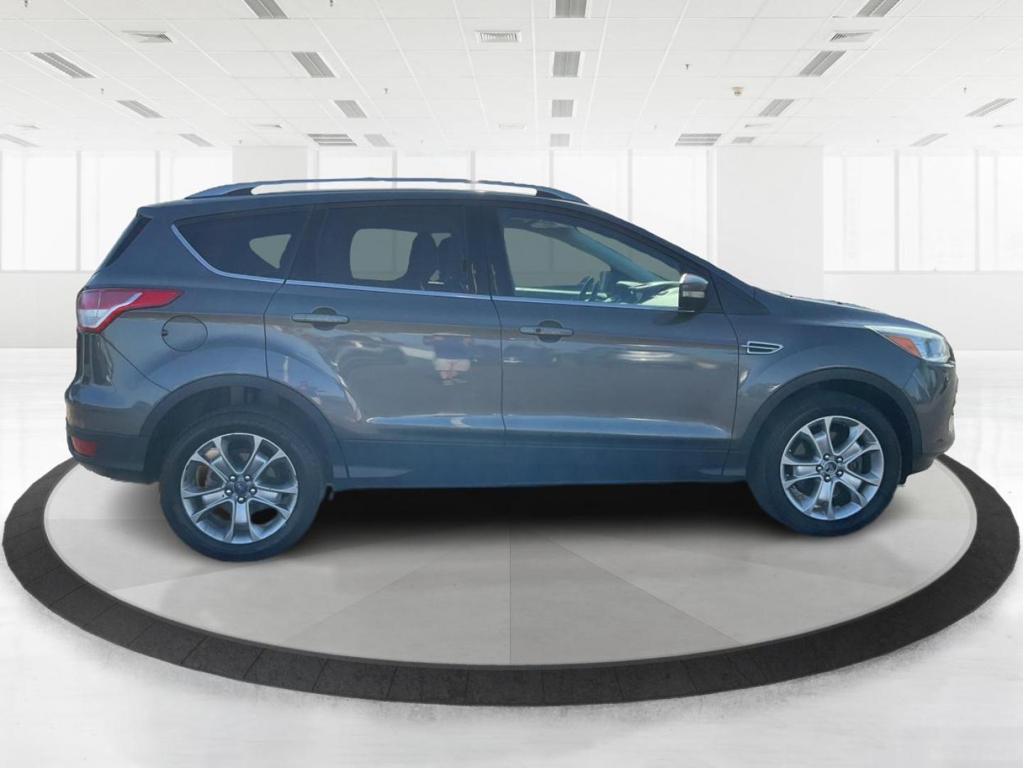 2016 Ford Escape Titanium (1FMCU9J92GU) with an EcoBoost 1.6L I-4 gasoline direct injection engine, located at 1184 Kauffman Ave, Fairborn, OH, 45324, (937) 908-9800, 39.807072, -84.030914 - 2016 Ford Escape Titanium - Photo#1