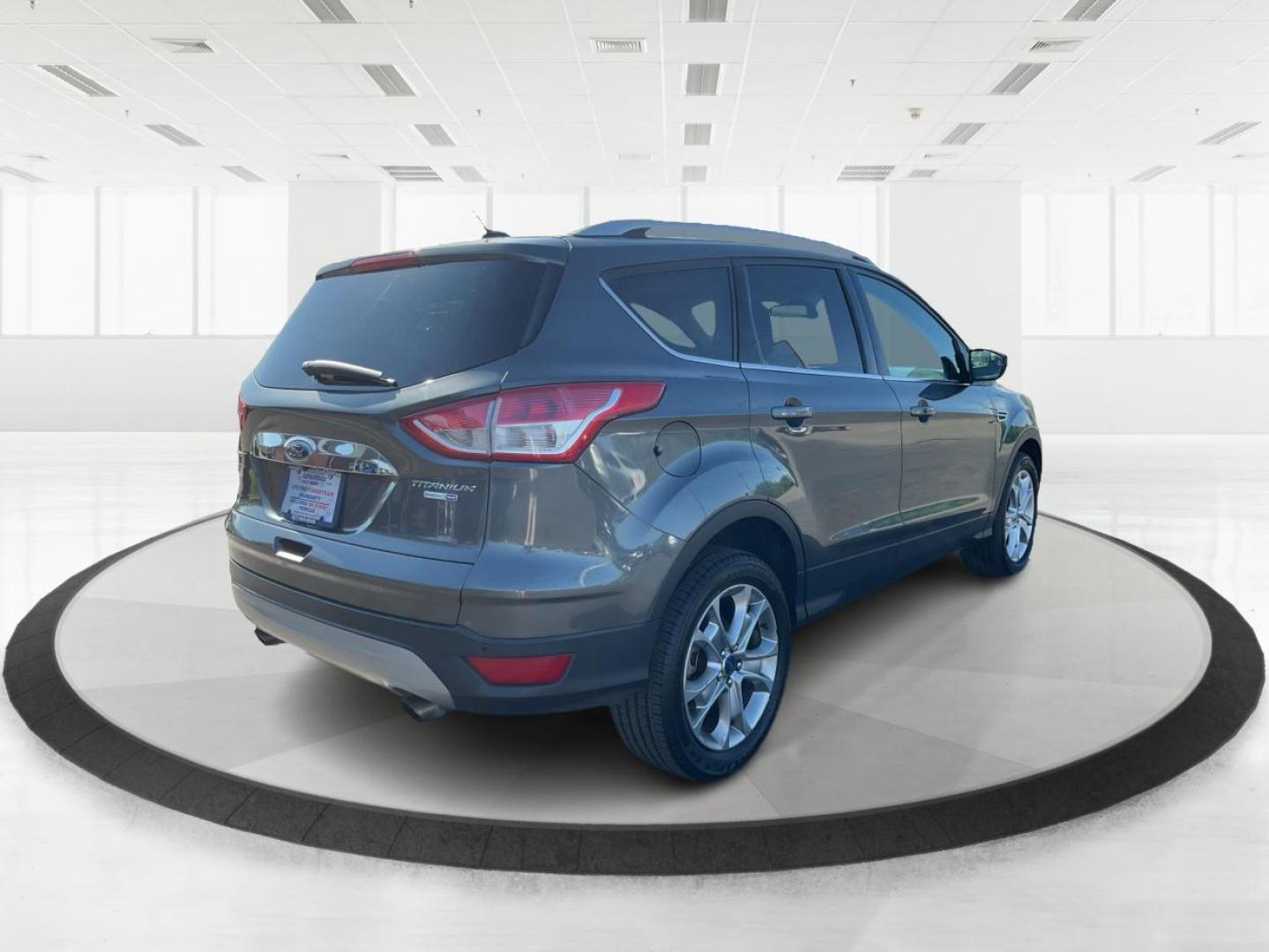 2016 Ford Escape Titanium (1FMCU9J92GU) with an EcoBoost 1.6L I-4 gasoline direct injection engine, located at 1184 Kauffman Ave, Fairborn, OH, 45324, (937) 908-9800, 39.807072, -84.030914 - 2016 Ford Escape Titanium - Photo#2