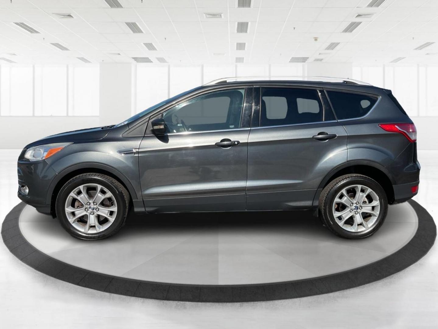2016 Ford Escape Titanium (1FMCU9J92GU) with an EcoBoost 1.6L I-4 gasoline direct injection engine, located at 1184 Kauffman Ave, Fairborn, OH, 45324, (937) 908-9800, 39.807072, -84.030914 - 2016 Ford Escape Titanium - Photo#5