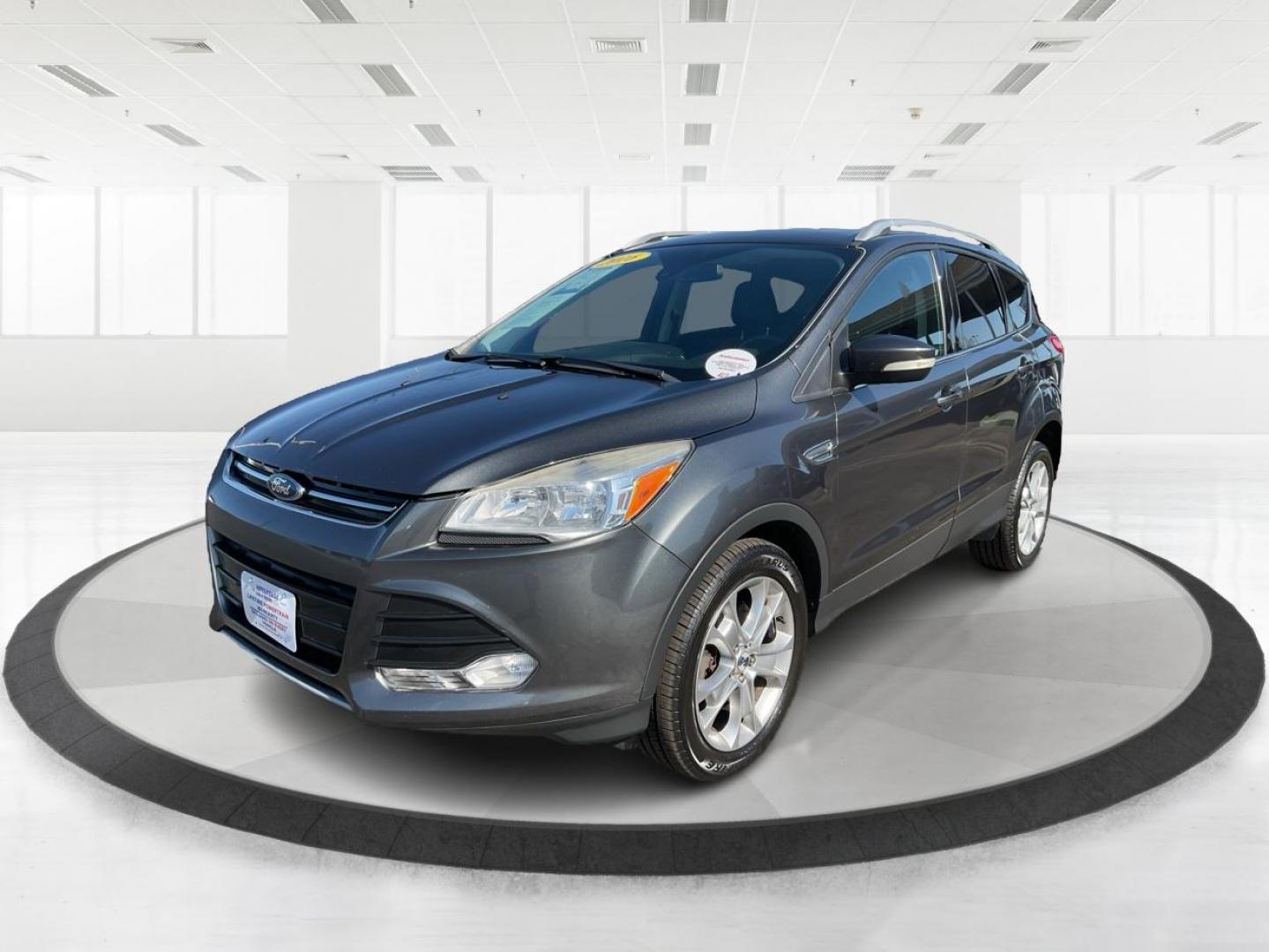 2016 Ford Escape Titanium (1FMCU9J92GU) with an EcoBoost 1.6L I-4 gasoline direct injection engine, located at 1184 Kauffman Ave, Fairborn, OH, 45324, (937) 908-9800, 39.807072, -84.030914 - 2016 Ford Escape Titanium - Photo#7