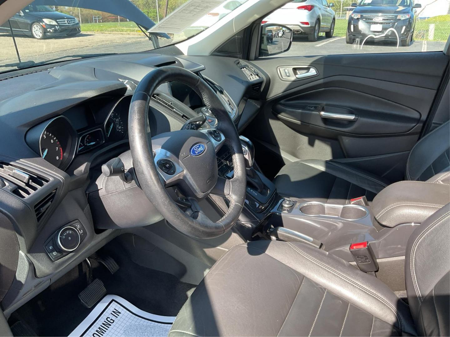 2016 Ford Escape Titanium (1FMCU9J92GU) with an EcoBoost 1.6L I-4 gasoline direct injection engine, located at 1184 Kauffman Ave, Fairborn, OH, 45324, (937) 908-9800, 39.807072, -84.030914 - 2016 Ford Escape Titanium - Photo#8