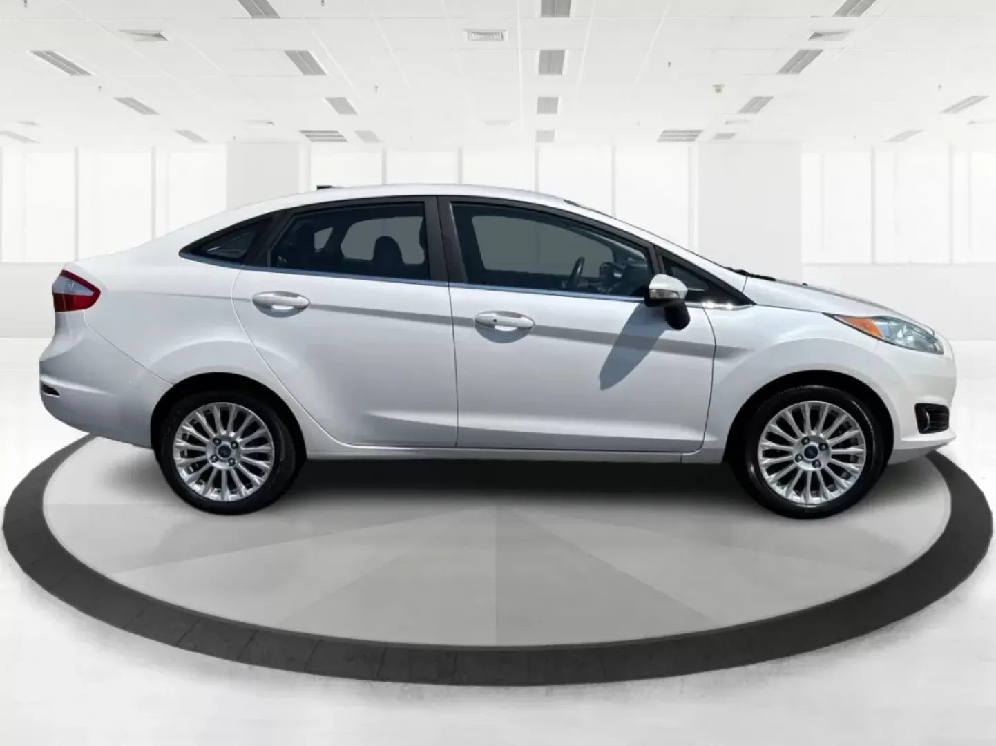 2016 Ford Fiesta Titanium (3FADP4CJ9GM) with an 1.6L I-4 DOHC engine, located at 880 E. National Road, Vandalia, OH, 45377, (937) 908-9800, 39.891918, -84.183594 - **Experience the Ultimate in Style and Comfort with the 2016 Ford Fiesta Titanium Sedan!**<br /> <br /> Are you looking for a stylish yet practical vehicle that fits seamlessly into your daily life? The 2016 Ford Fiesta Titanium Sedan is designed for those who crave sophistication without sacrificin - Photo#1