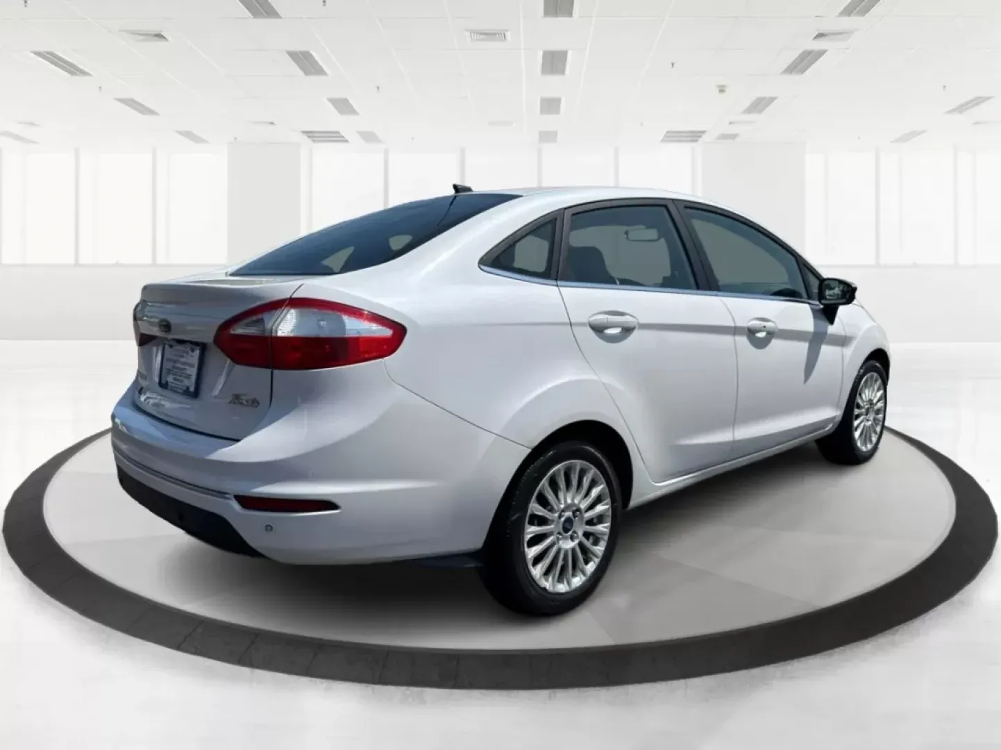 2016 Ford Fiesta Titanium (3FADP4CJ9GM) with an 1.6L I-4 DOHC engine, located at 880 E. National Road, Vandalia, OH, 45377, (937) 908-9800, 39.891918, -84.183594 - **Experience the Ultimate in Style and Comfort with the 2016 Ford Fiesta Titanium Sedan!**<br /> <br /> Are you looking for a stylish yet practical vehicle that fits seamlessly into your daily life? The 2016 Ford Fiesta Titanium Sedan is designed for those who crave sophistication without sacrificin - Photo#2