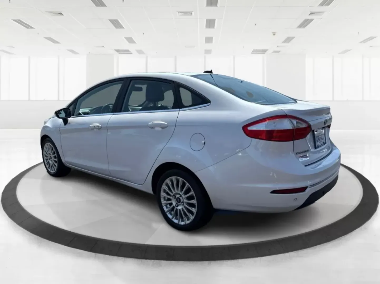 2016 Ford Fiesta Titanium (3FADP4CJ9GM) with an 1.6L I-4 DOHC engine, located at 880 E. National Road, Vandalia, OH, 45377, (937) 908-9800, 39.891918, -84.183594 - **Experience the Ultimate in Style and Comfort with the 2016 Ford Fiesta Titanium Sedan!**<br /> <br /> Are you looking for a stylish yet practical vehicle that fits seamlessly into your daily life? The 2016 Ford Fiesta Titanium Sedan is designed for those who crave sophistication without sacrificin - Photo#4