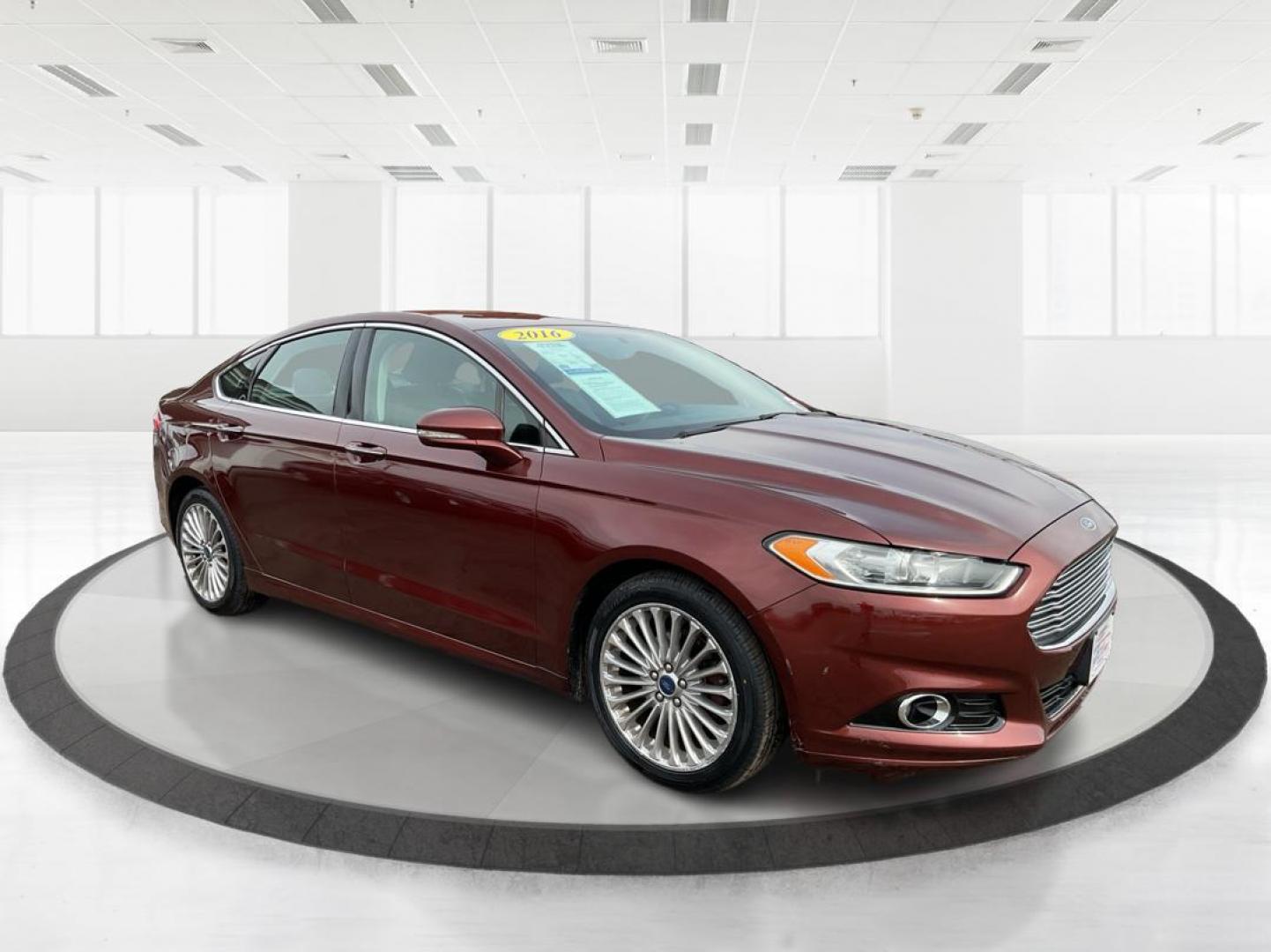 2016 Ford Fusion Titanium (3FA6P0K92GR) with an EcoBoost 2L I-4 gasoline direct injection engine, located at 4508 South Dixie Dr, Moraine, OH, 45439, (937) 908-9800, 39.689976, -84.218452 - 2016 Ford Fusion Titanium - Photo#0