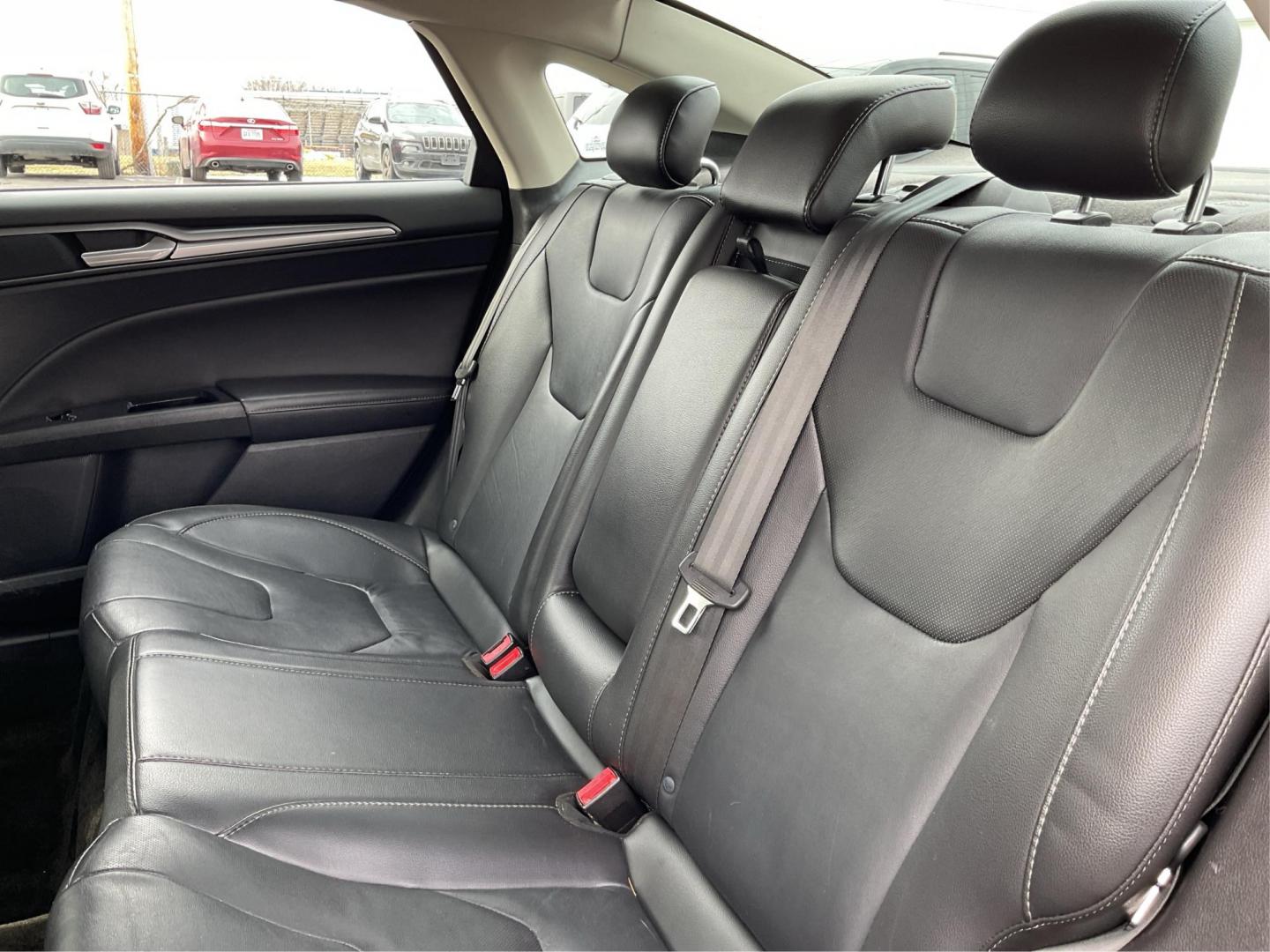 2016 Ford Fusion Titanium (3FA6P0K92GR) with an EcoBoost 2L I-4 gasoline direct injection engine, located at 4508 South Dixie Dr, Moraine, OH, 45439, (937) 908-9800, 39.689976, -84.218452 - 2016 Ford Fusion Titanium - Photo#9