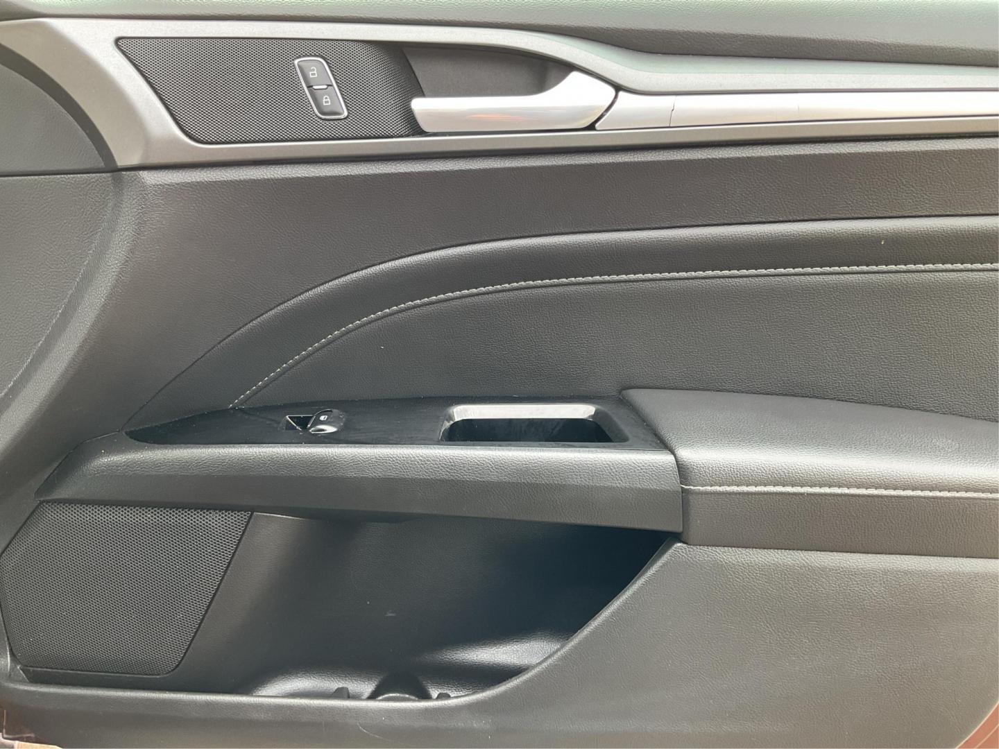2016 Ford Fusion Titanium (3FA6P0K92GR) with an EcoBoost 2L I-4 gasoline direct injection engine, located at 4508 South Dixie Dr, Moraine, OH, 45439, (937) 908-9800, 39.689976, -84.218452 - 2016 Ford Fusion Titanium - Photo#19