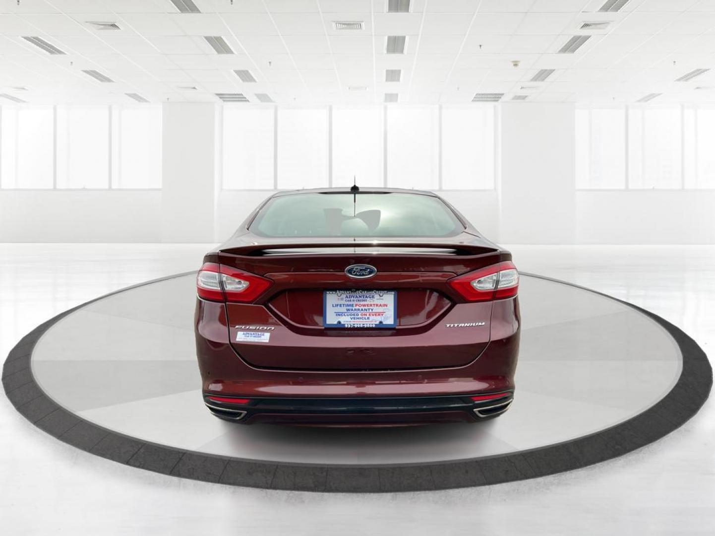 2016 Ford Fusion Titanium (3FA6P0K92GR) with an EcoBoost 2L I-4 gasoline direct injection engine, located at 4508 South Dixie Dr, Moraine, OH, 45439, (937) 908-9800, 39.689976, -84.218452 - 2016 Ford Fusion Titanium - Photo#3
