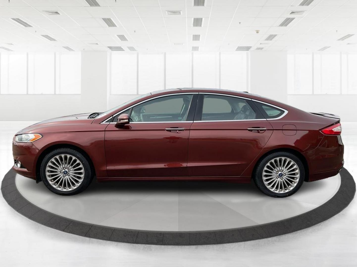 2016 Ford Fusion Titanium (3FA6P0K92GR) with an EcoBoost 2L I-4 gasoline direct injection engine, located at 4508 South Dixie Dr, Moraine, OH, 45439, (937) 908-9800, 39.689976, -84.218452 - 2016 Ford Fusion Titanium - Photo#5