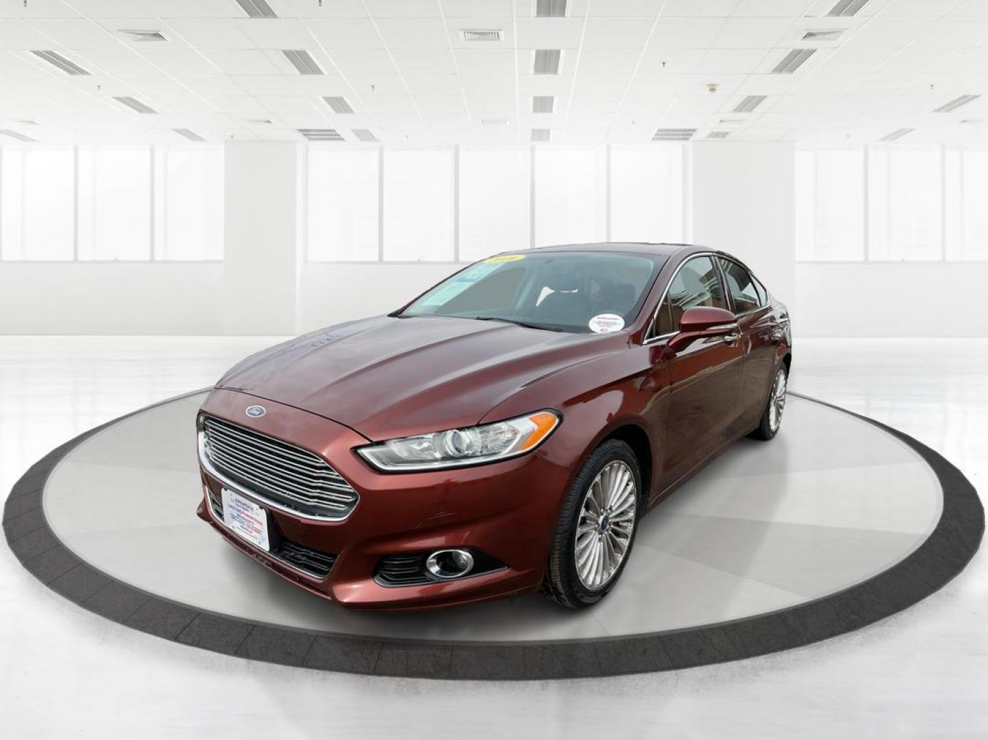 2016 Ford Fusion Titanium (3FA6P0K92GR) with an EcoBoost 2L I-4 gasoline direct injection engine, located at 4508 South Dixie Dr, Moraine, OH, 45439, (937) 908-9800, 39.689976, -84.218452 - 2016 Ford Fusion Titanium - Photo#7