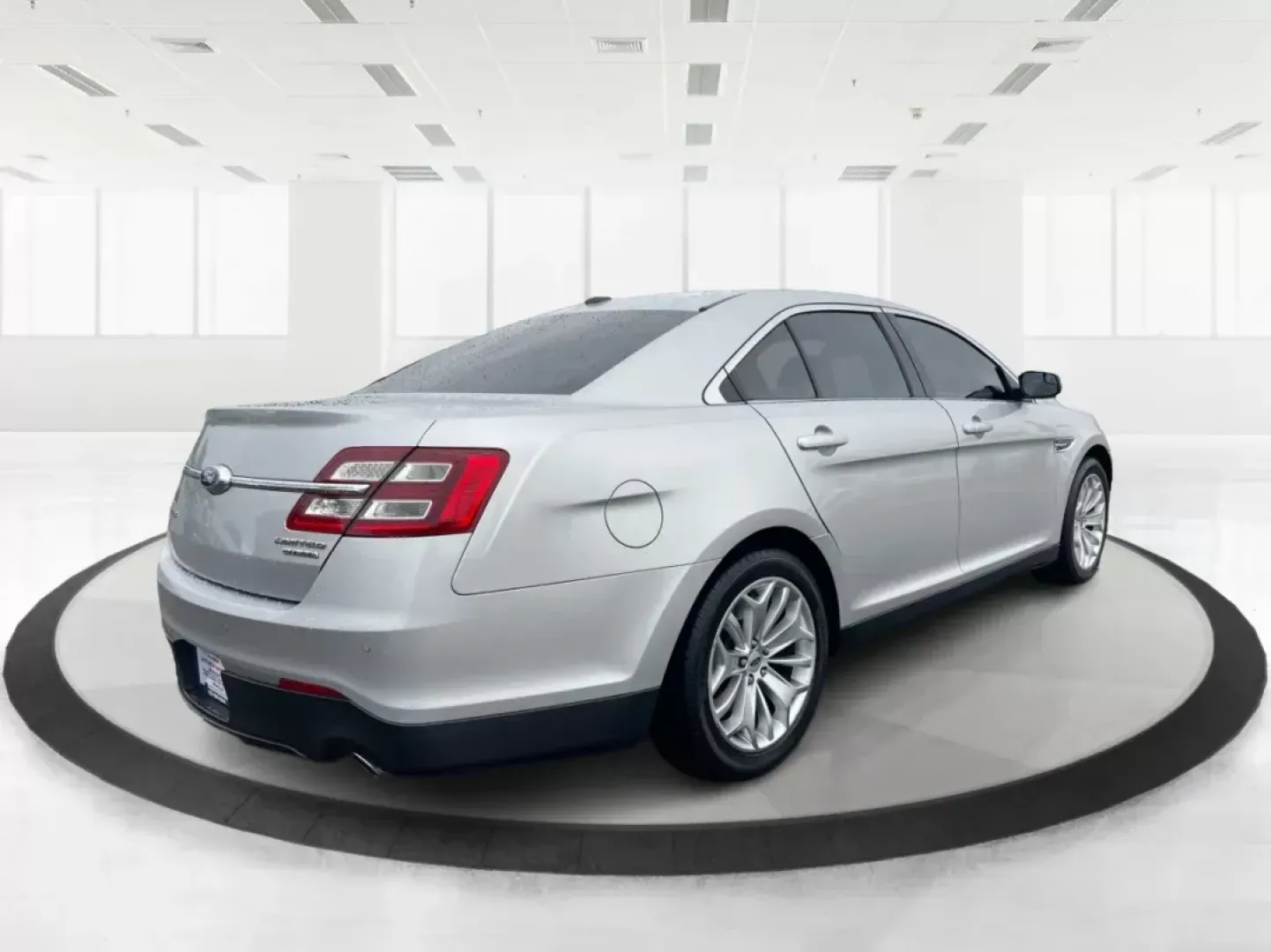 2016 Ford Taurus Limited (1FAHP2F82GG) with an EcoBoost 2L I-4 gasoline direct injection engine, located at 8750 N County Rd 25A, Piqua, OH, 45356, (937) 908-9800, 40.164391, -84.232513 - **Experience the Ultimate in Comfort and Style with the 2016 Ford Taurus Limited at Advantage Car and Credit!**<br /> <br /> Are you searching for a reliable sedan that seamlessly fits into your busy lifestyle? Whether you're commuting to work, taking the kids to soccer practice, or planning a weeke - Photo#2