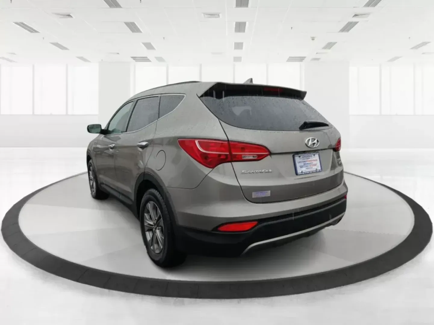 2016 Hyundai Santa Fe Sport 2.4 AWD (5XYZUDLB9GG) with an 2.4L L4 DOHC 16V engine, 6-Speed Automatic transmission, located at 880 E. National Road, Vandalia, OH, 45377, (937) 908-9800, 39.891918, -84.183594 - 2016 Hyundai Santa Fe Sport 2.4 AWD - Photo#4