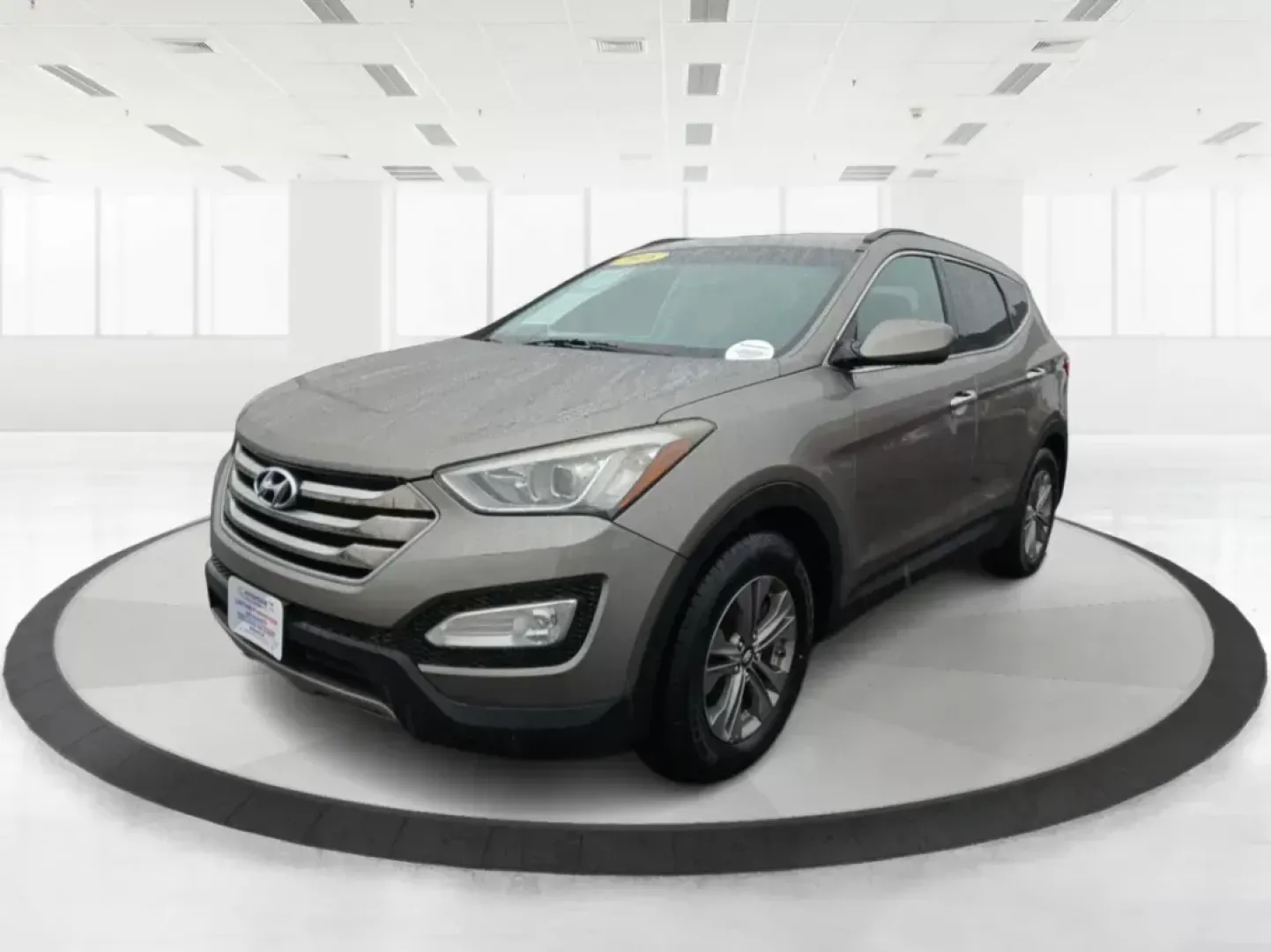 2016 Hyundai Santa Fe Sport 2.4 AWD (5XYZUDLB9GG) with an 2.4L L4 DOHC 16V engine, 6-Speed Automatic transmission, located at 880 E. National Road, Vandalia, OH, 45377, (937) 908-9800, 39.891918, -84.183594 - 2016 Hyundai Santa Fe Sport 2.4 AWD - Photo#7