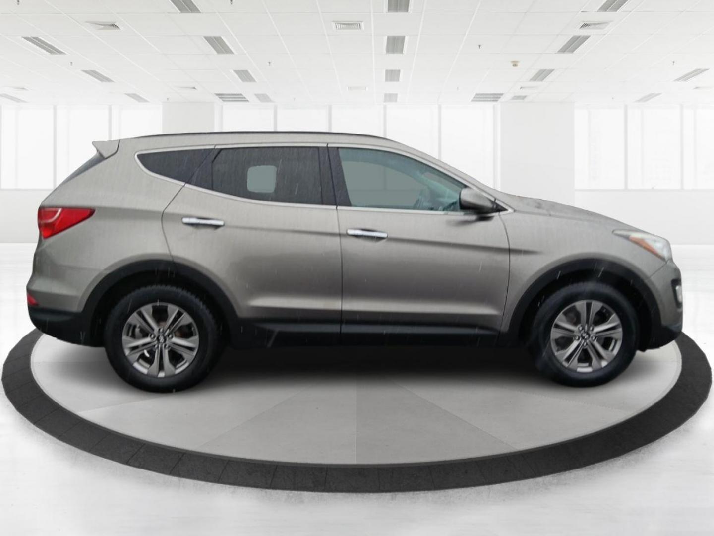 2016 Hyundai Santa Fe Sport 2.4 AWD (5XYZUDLB9GG) with an 2.4L L4 DOHC 16V engine, 6-Speed Automatic transmission, located at 401 Woodman Dr, Riverside, OH, 45431, (937) 908-9800, 39.760899, -84.123421 - 2016 Hyundai Santa Fe Sport 2.4 AWD - Photo#1