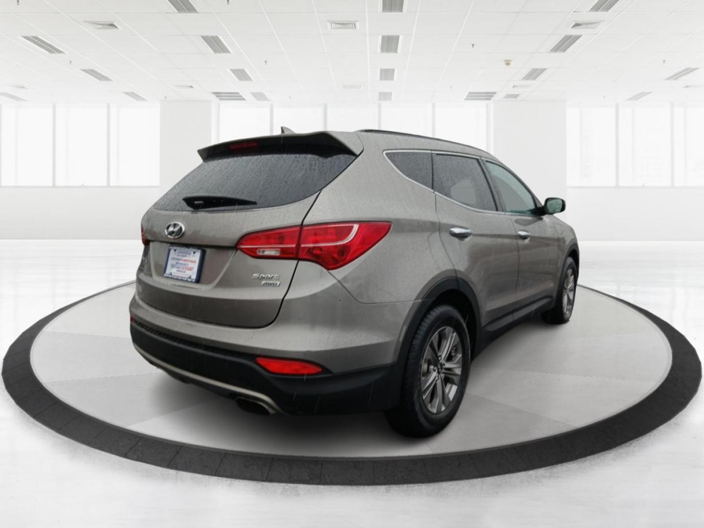 2016 Hyundai Santa Fe Sport 2.4 AWD (5XYZUDLB9GG) with an 2.4L L4 DOHC 16V engine, 6-Speed Automatic transmission, located at 401 Woodman Dr, Riverside, OH, 45431, (937) 908-9800, 39.760899, -84.123421 - 2016 Hyundai Santa Fe Sport 2.4 AWD - Photo#2