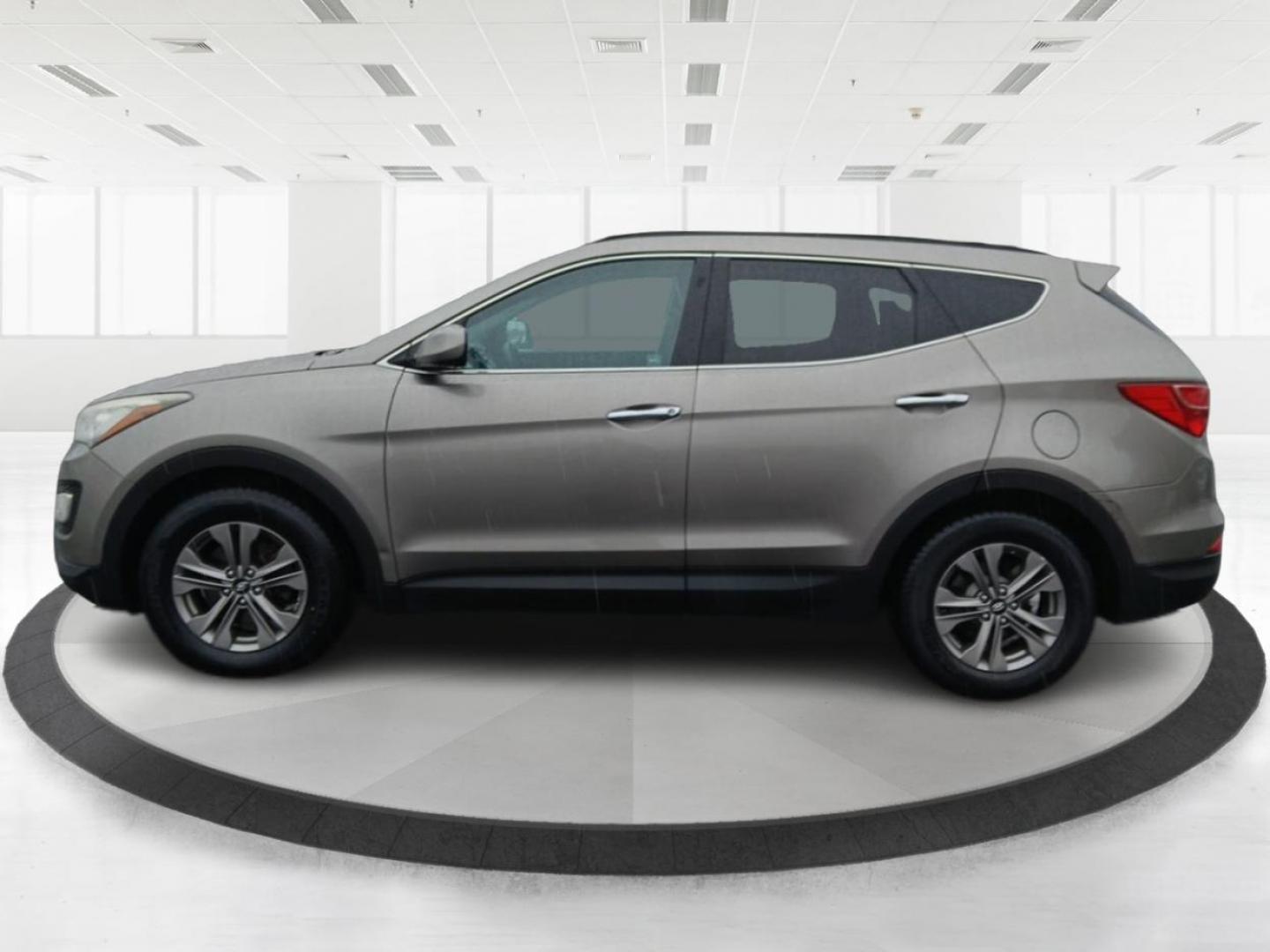 2016 Hyundai Santa Fe Sport 2.4 AWD (5XYZUDLB9GG) with an 2.4L L4 DOHC 16V engine, 6-Speed Automatic transmission, located at 401 Woodman Dr, Riverside, OH, 45431, (937) 908-9800, 39.760899, -84.123421 - 2016 Hyundai Santa Fe Sport 2.4 AWD - Photo#5