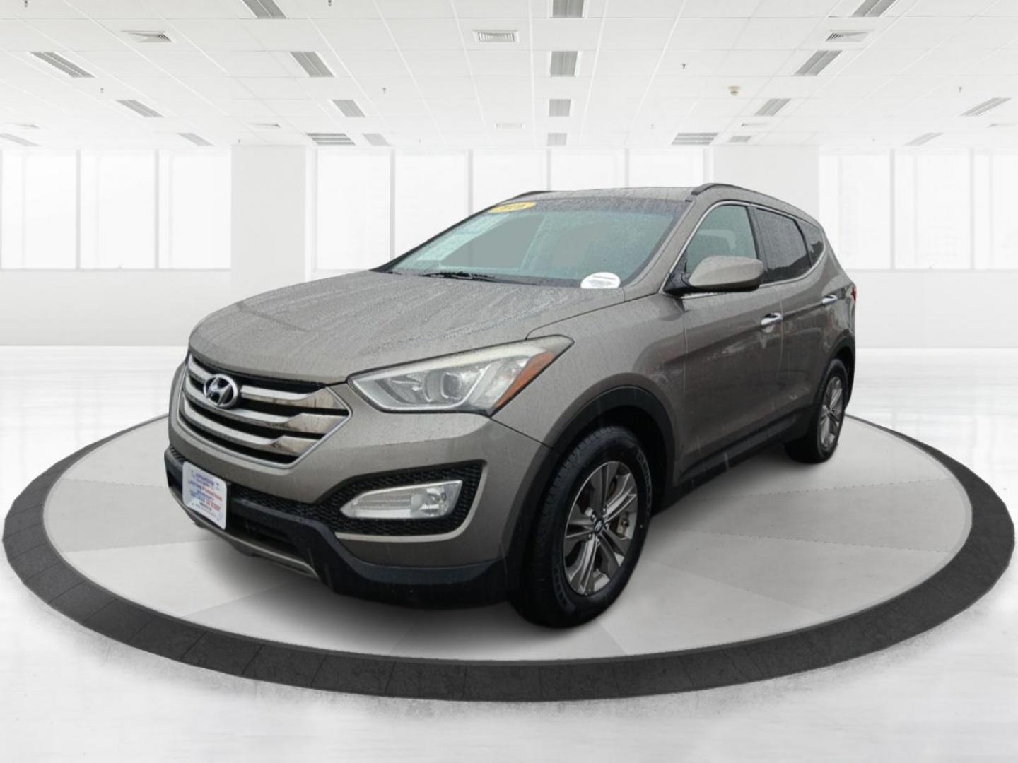 2016 Hyundai Santa Fe Sport 2.4 AWD (5XYZUDLB9GG) with an 2.4L L4 DOHC 16V engine, 6-Speed Automatic transmission, located at 401 Woodman Dr, Riverside, OH, 45431, (937) 908-9800, 39.760899, -84.123421 - 2016 Hyundai Santa Fe Sport 2.4 AWD - Photo#7